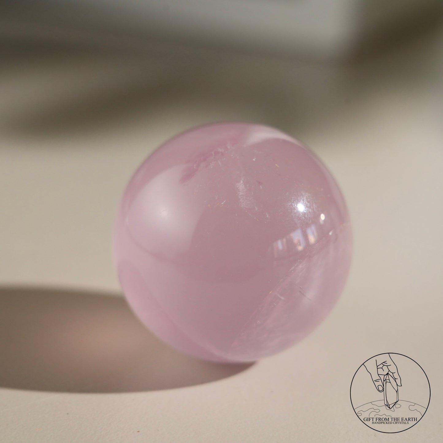 Mozambique starry rose quartz sphere