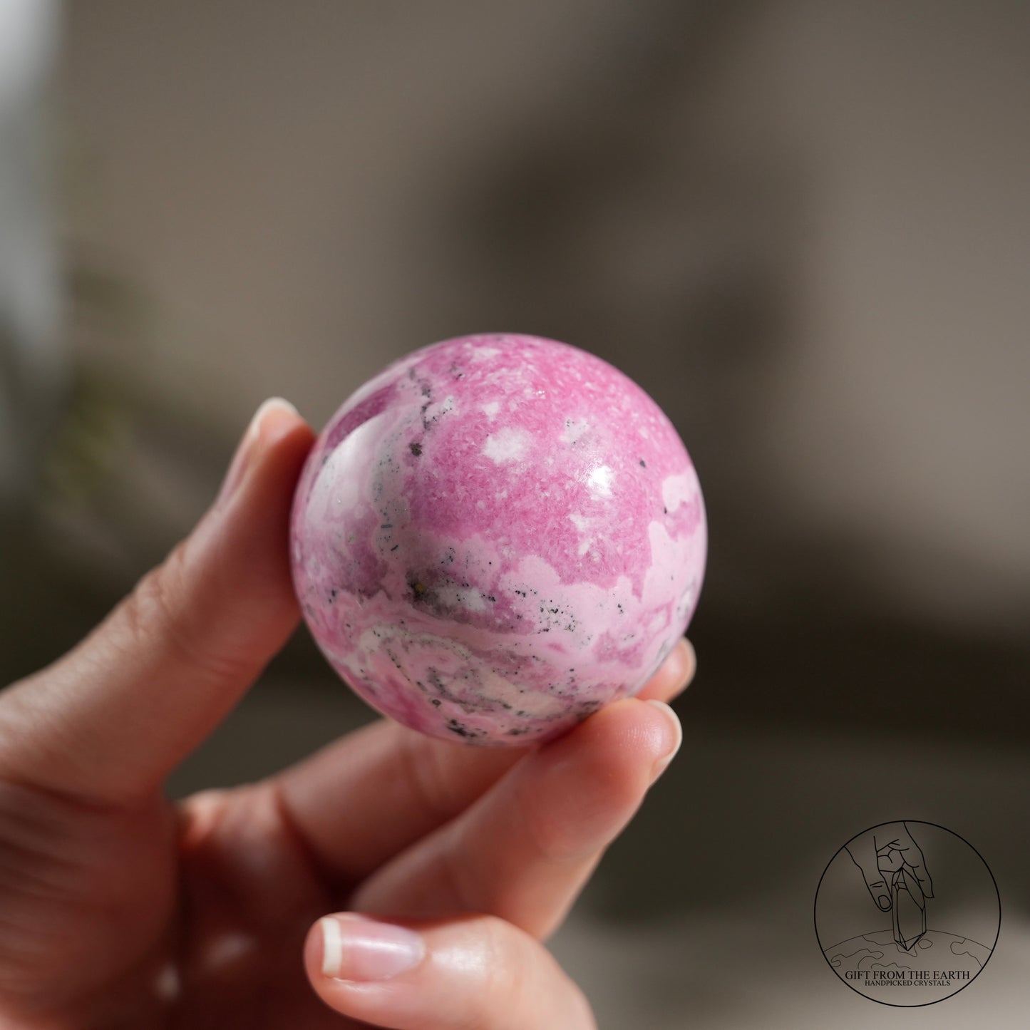 Peruvian rhodochrosite sphere