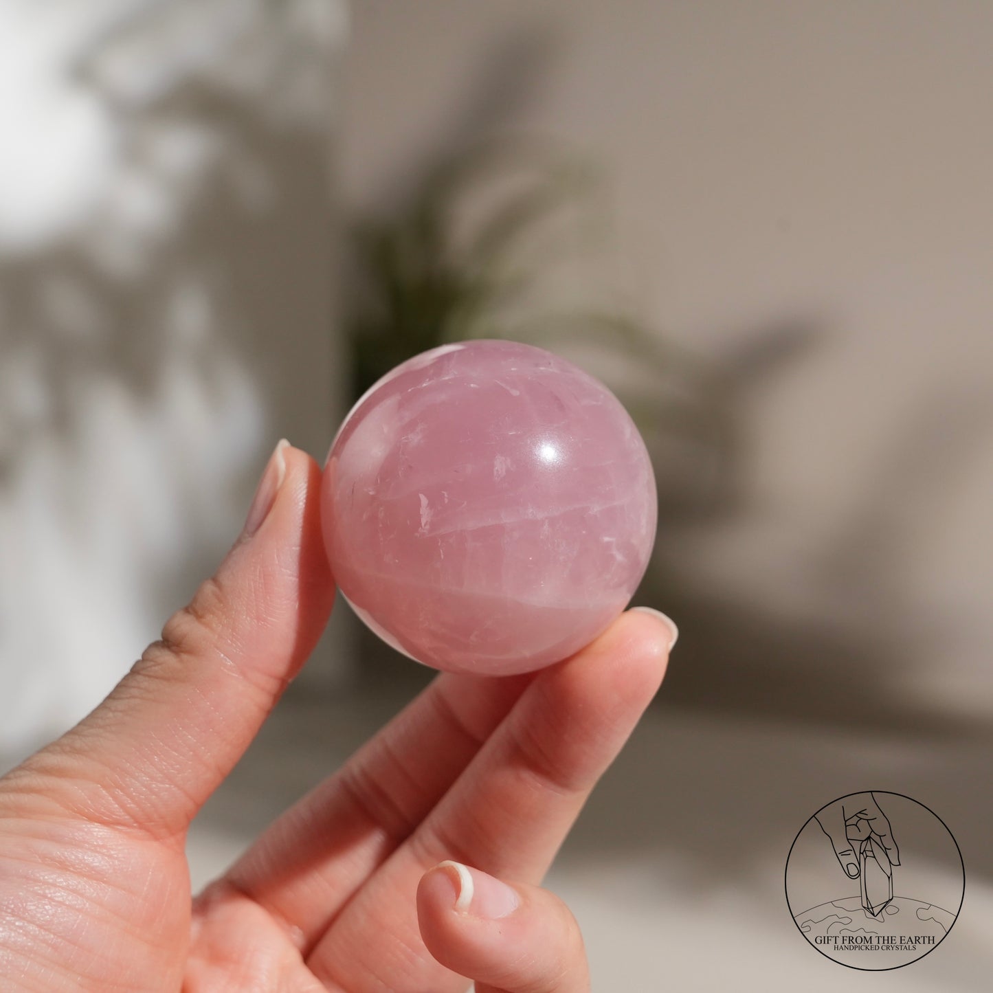 Mozambique starry rose quartz sphere