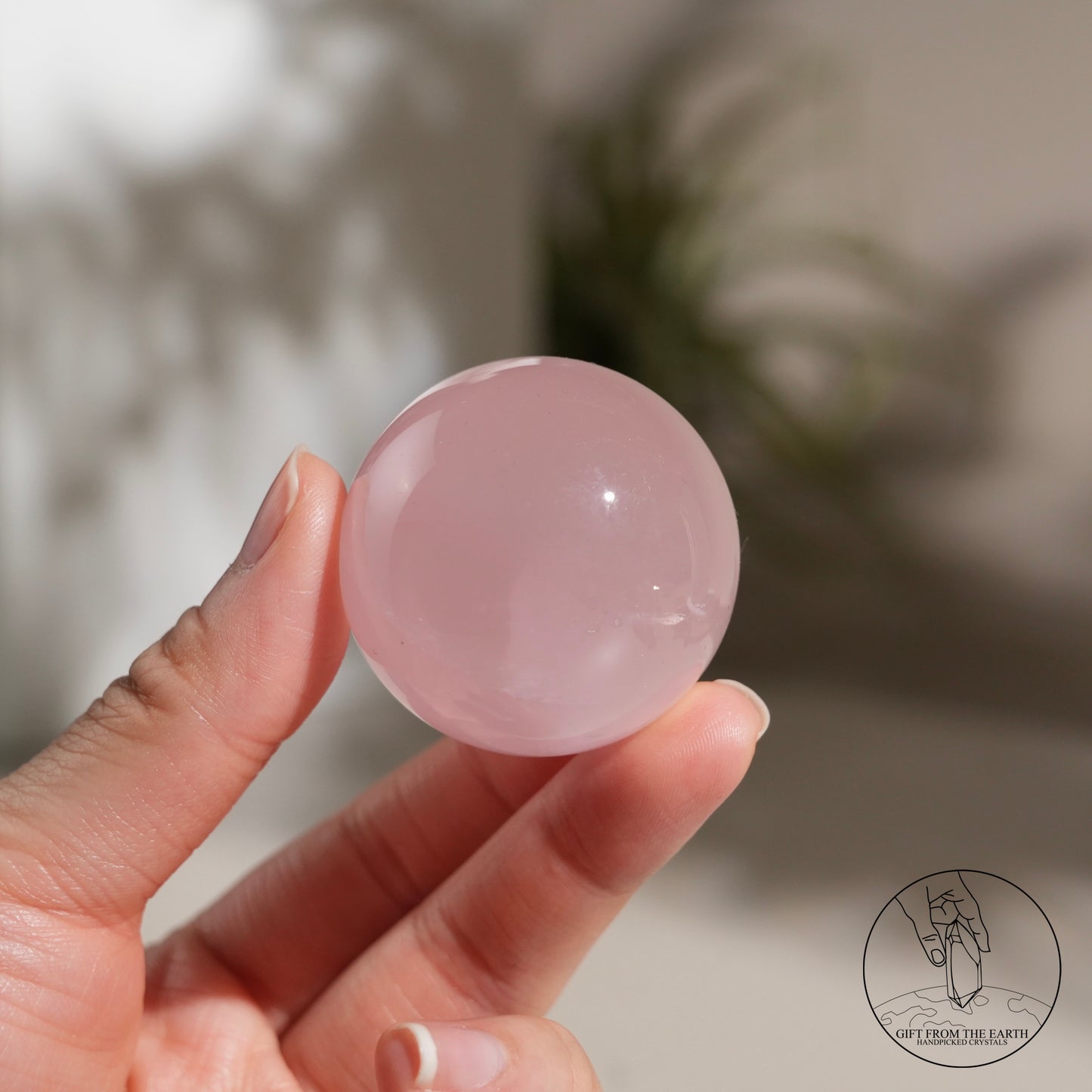 Mozambique starry rose quartz sphere