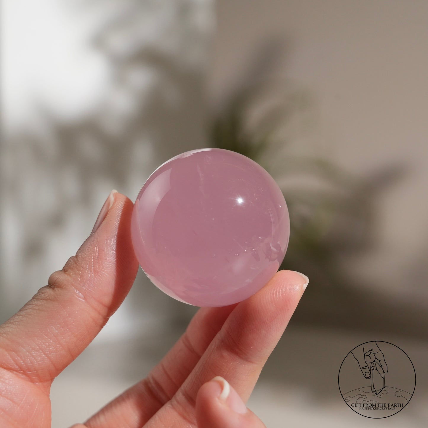 Mozambique starry rose quartz sphere