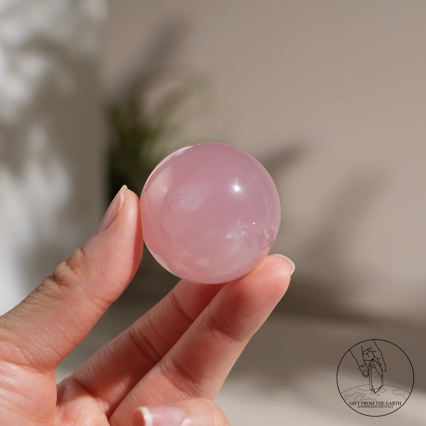 Mozambique starry rose quartz sphere