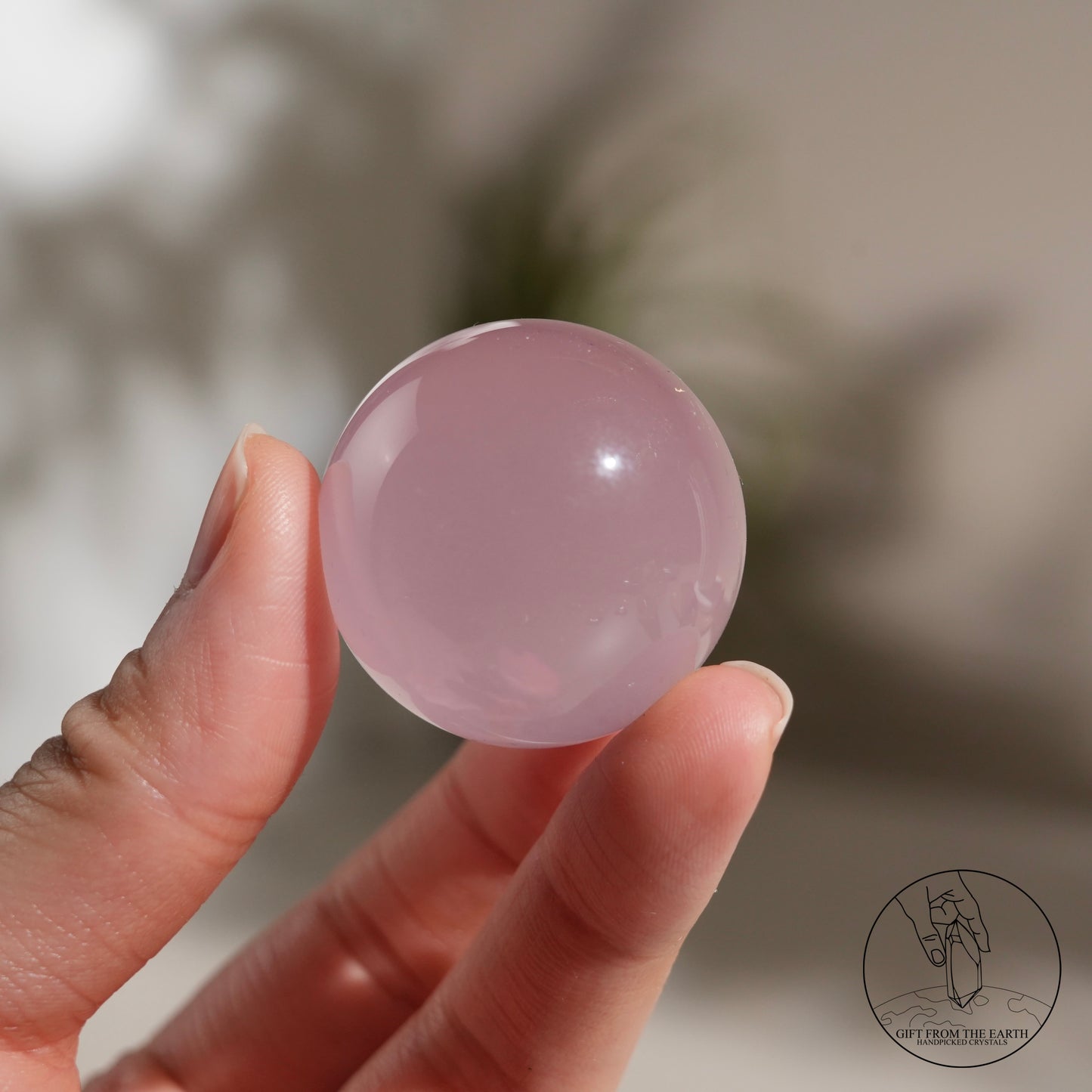 Mozambique starry rose quartz sphere