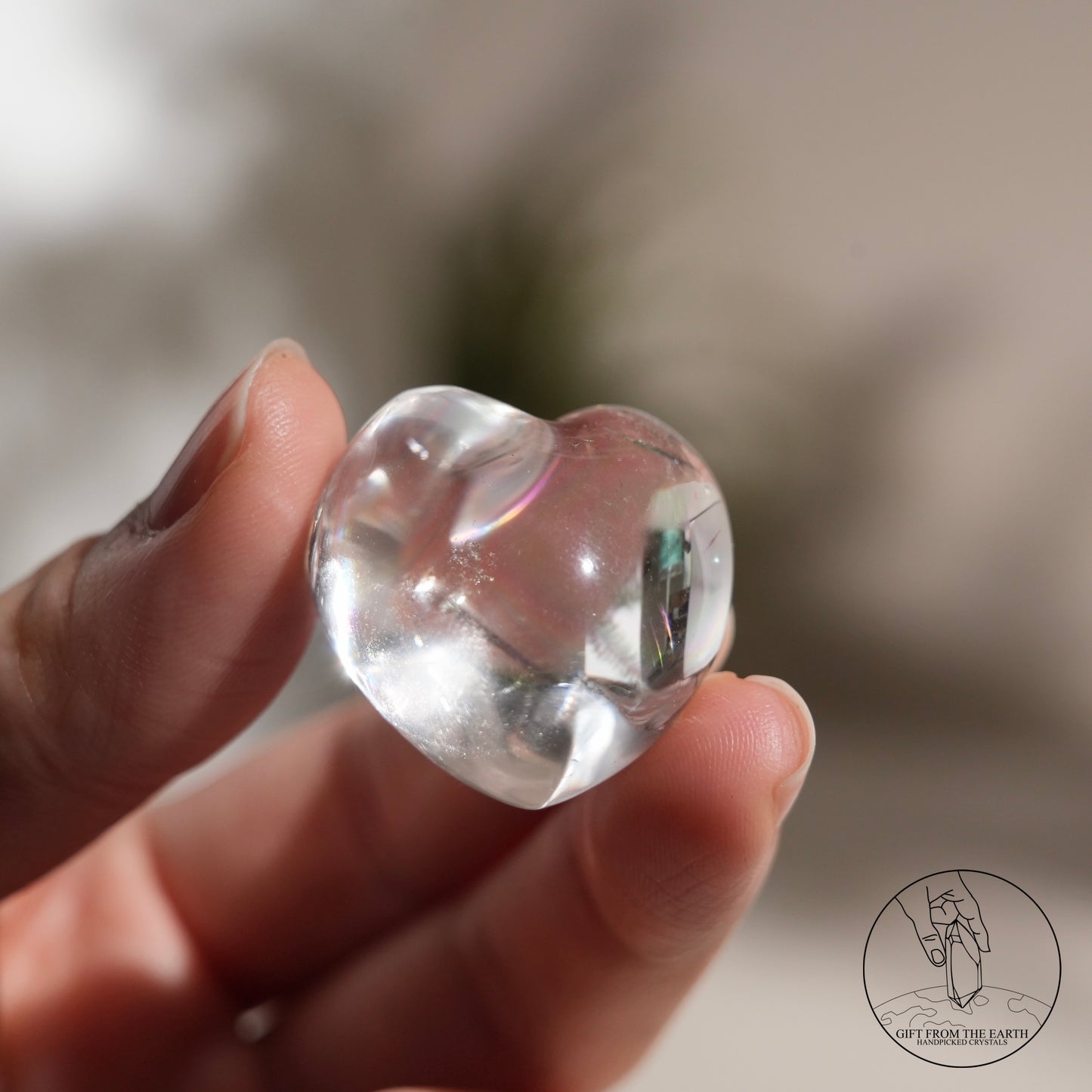 Rainbow clear quartz heart