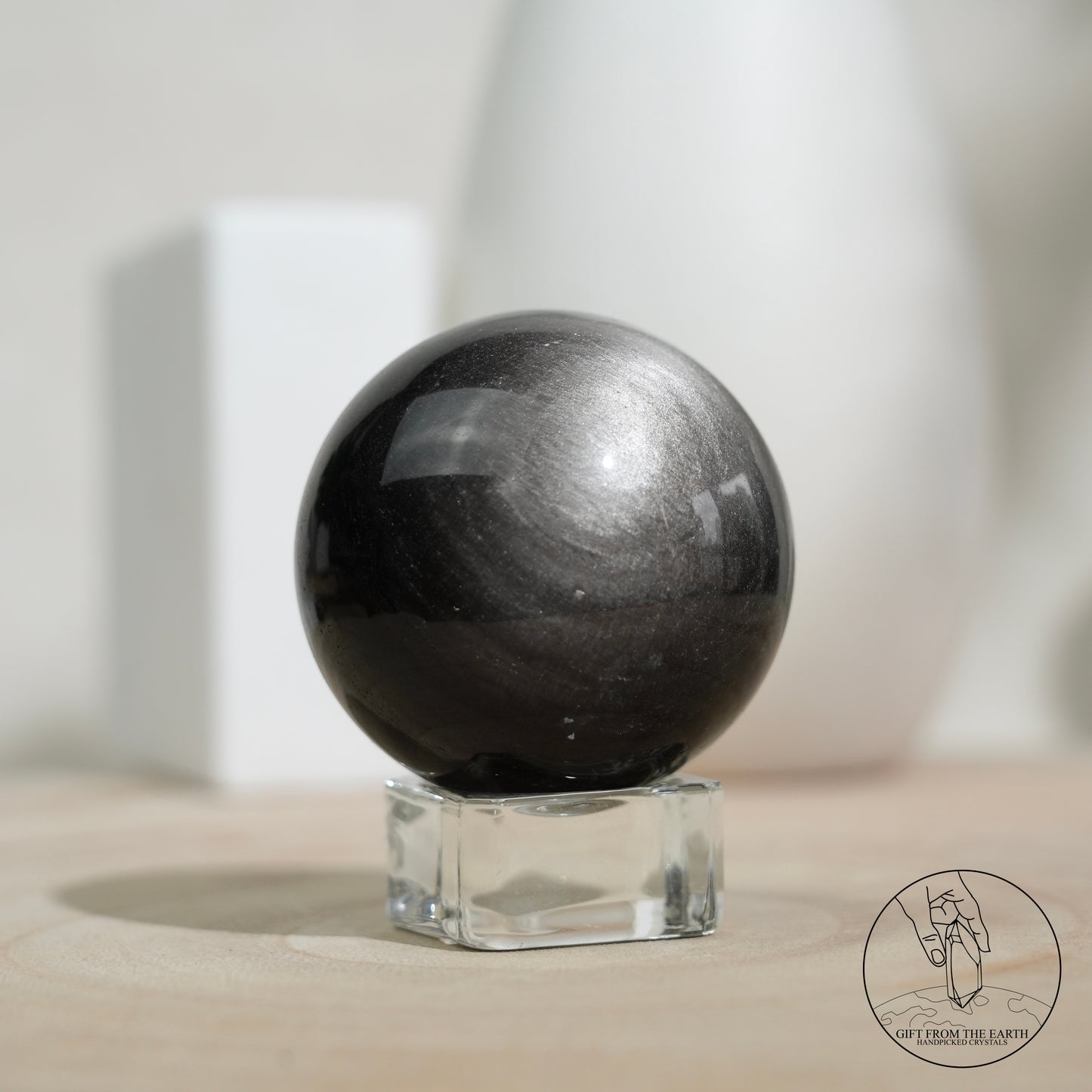 Silver sheen obsidian sphere
