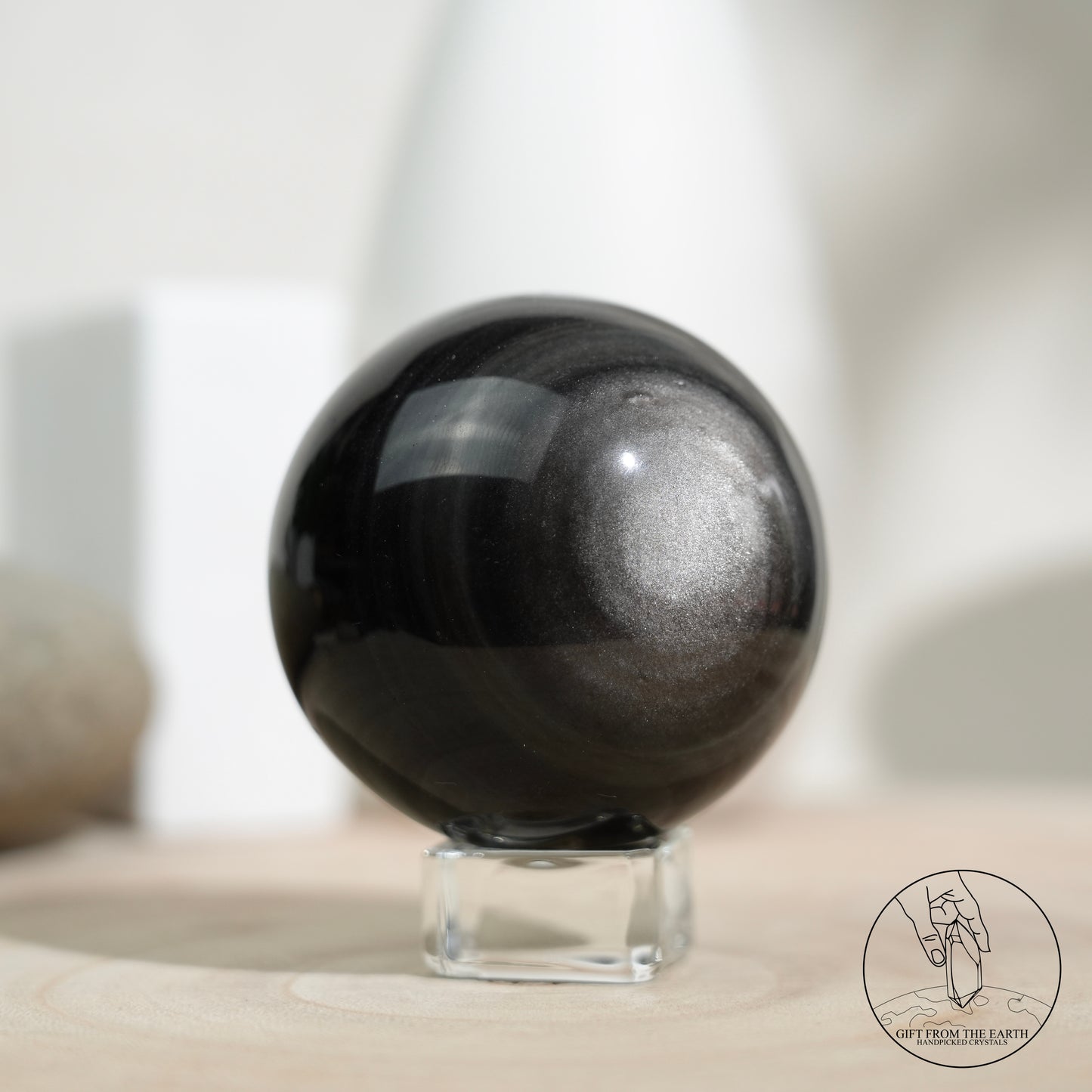 Silver sheen obsidian sphere