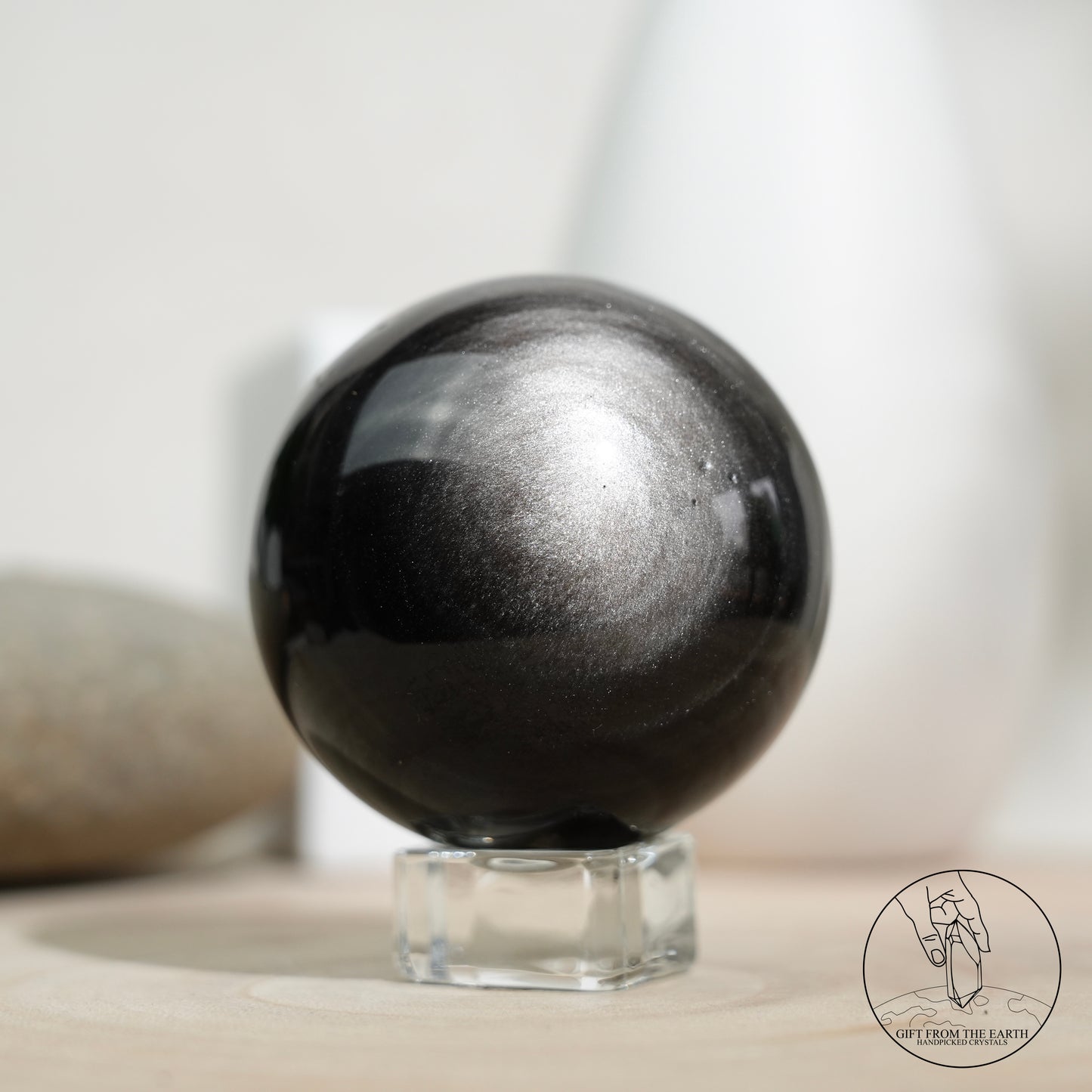 Silver sheen obsidian sphere