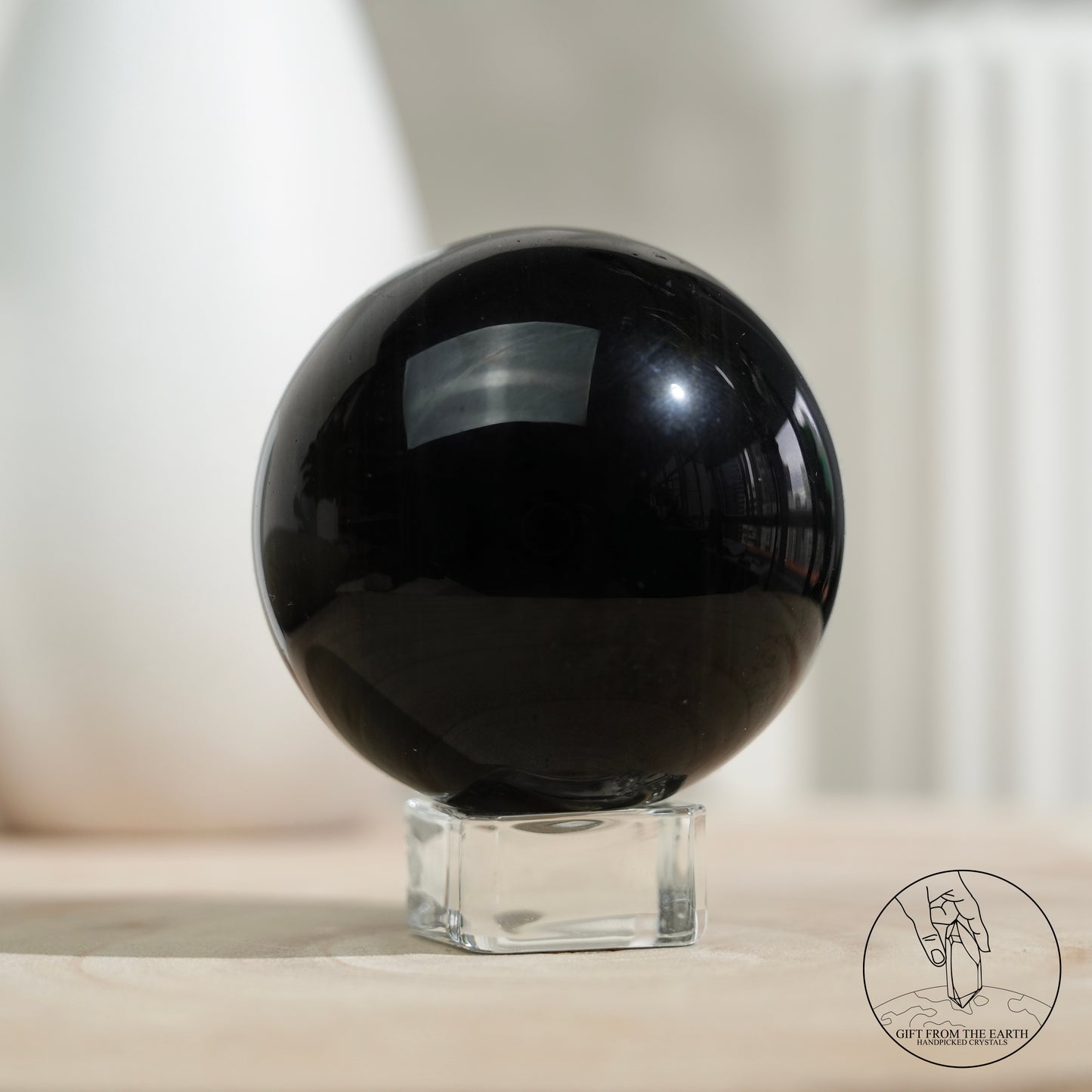 Silver sheen obsidian sphere