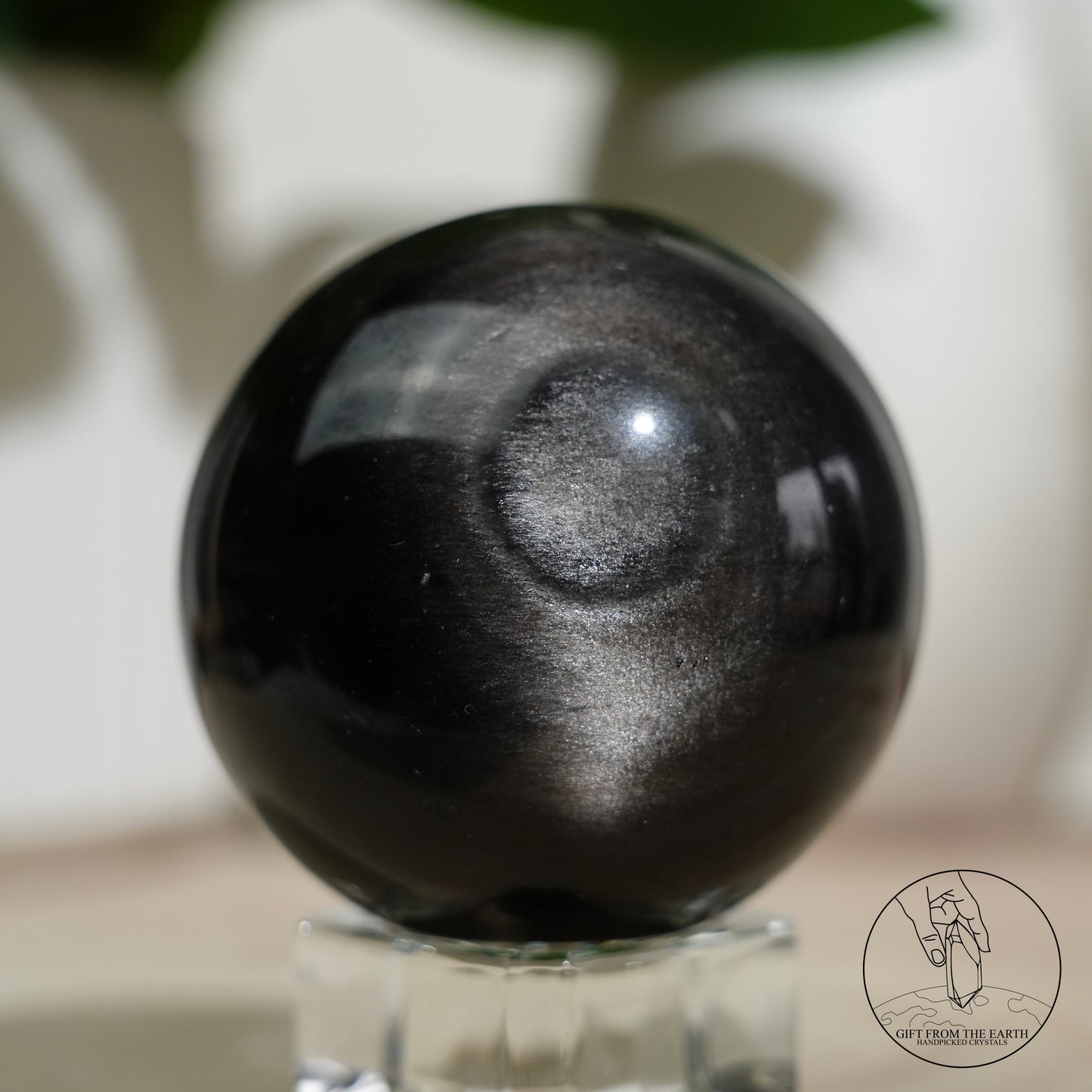 Silver sheen obsidian sphere