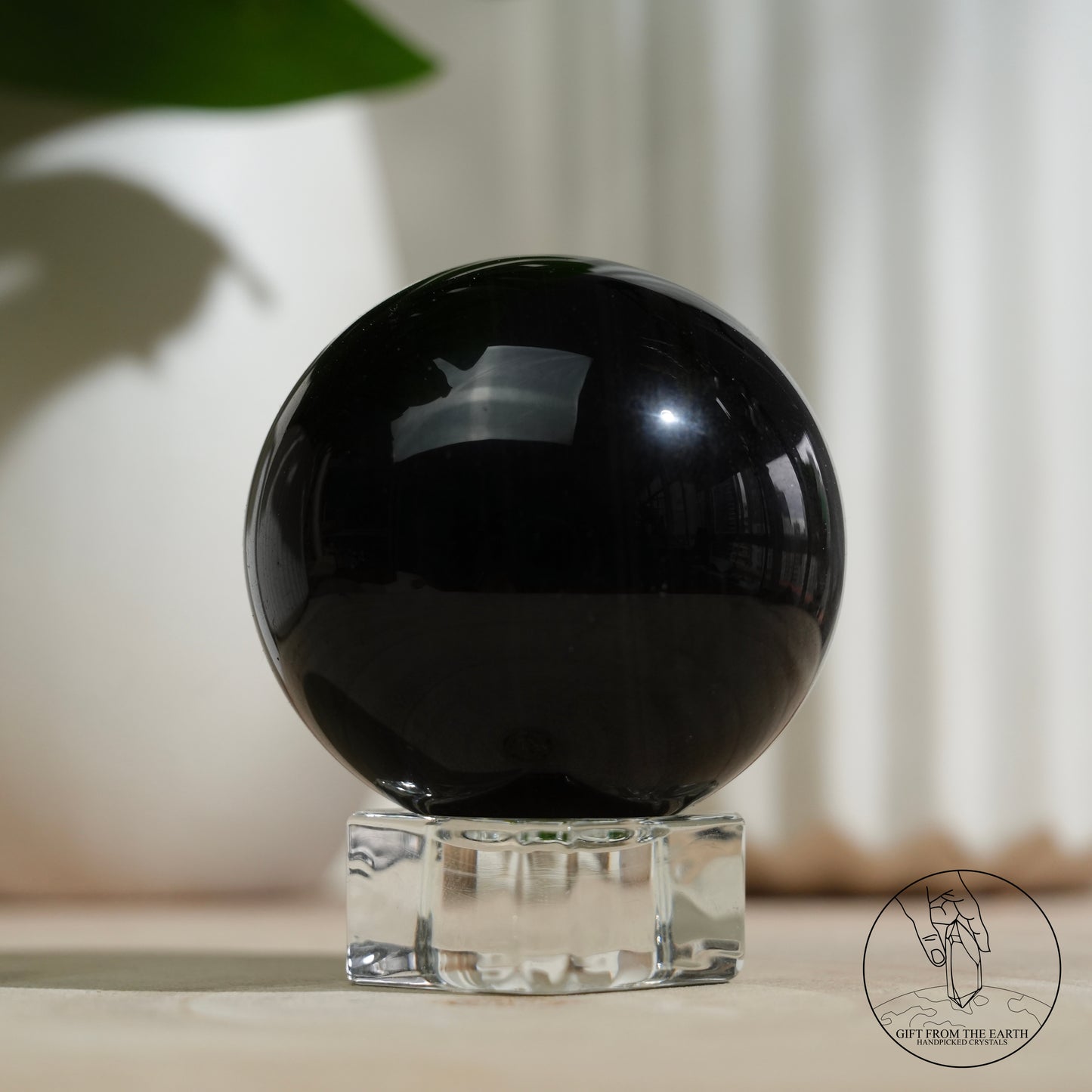 Silver sheen obsidian sphere