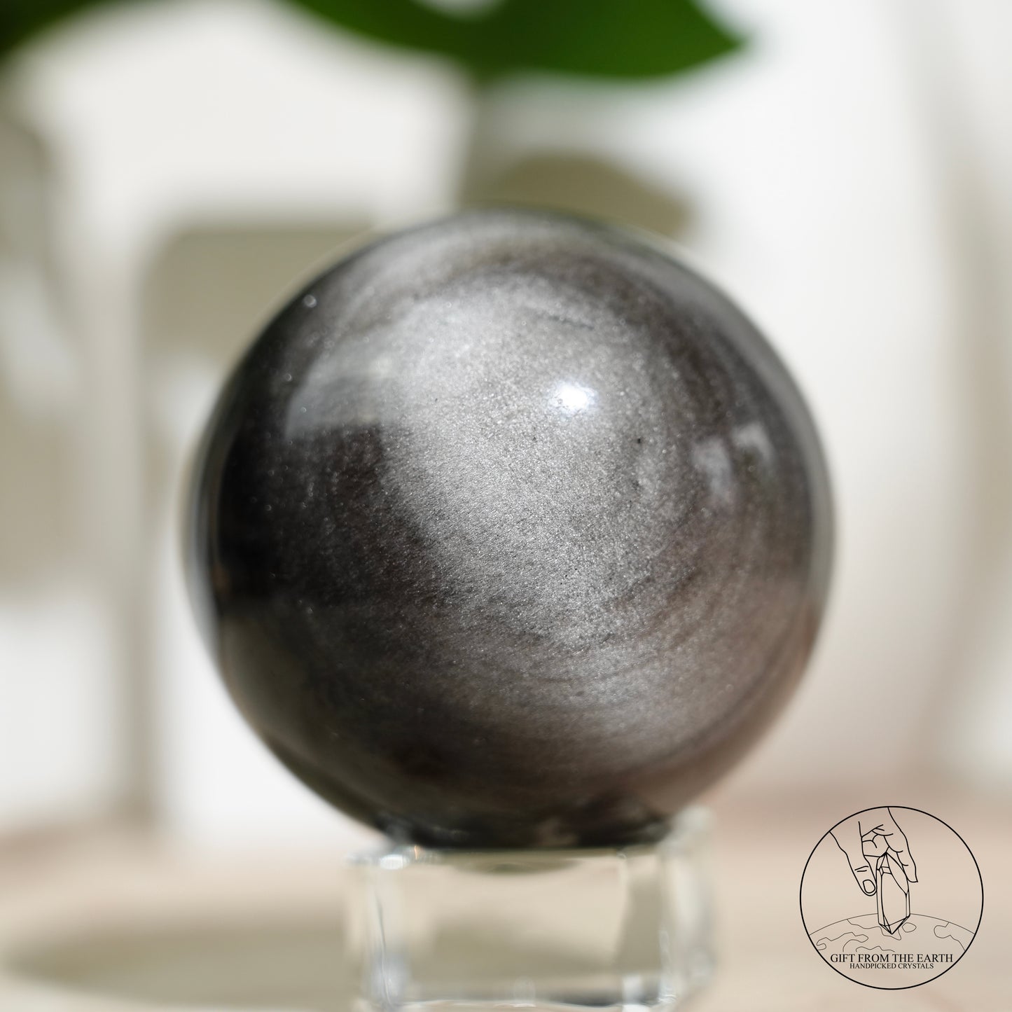 Silver sheen obsidian sphere