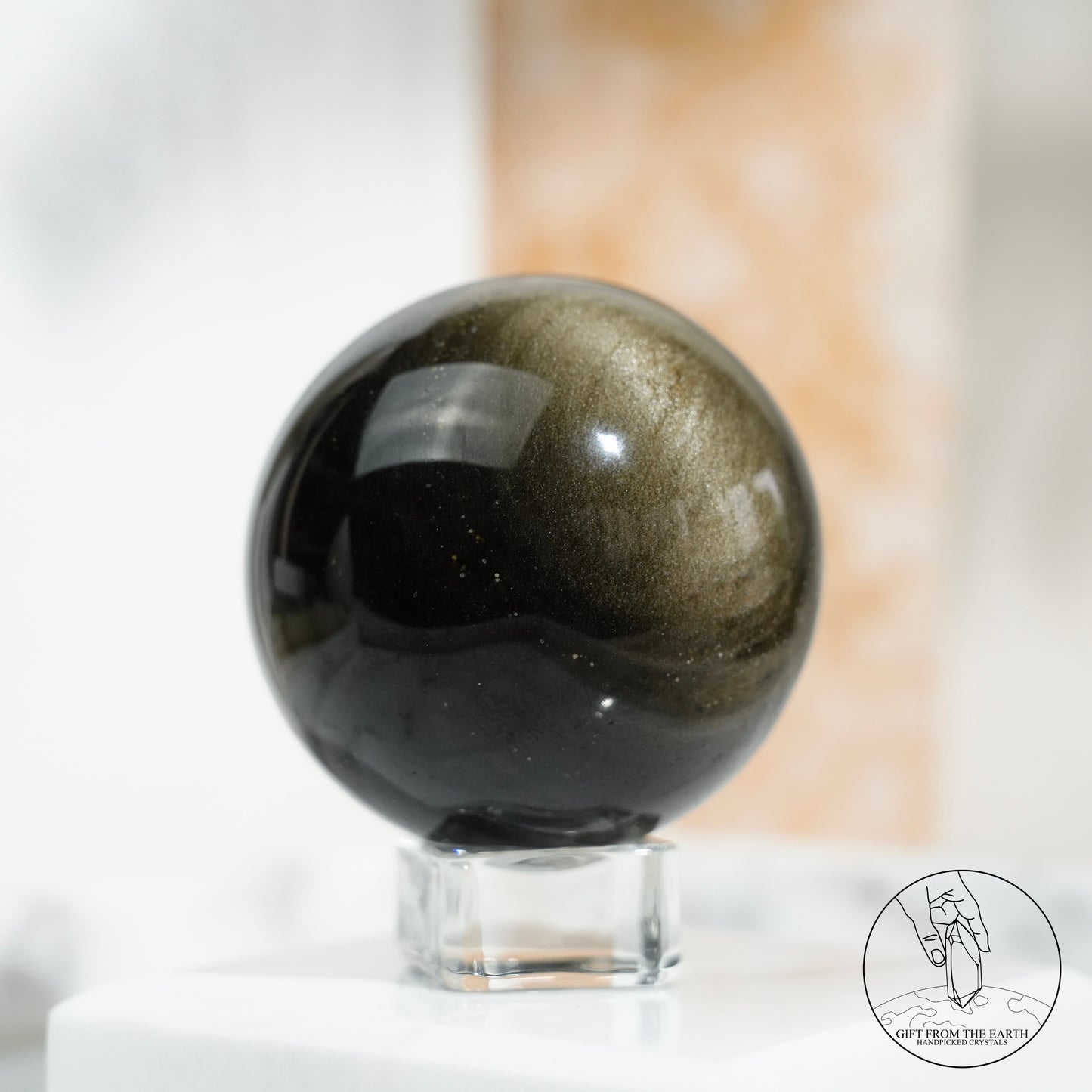 Golden obsidian sphere