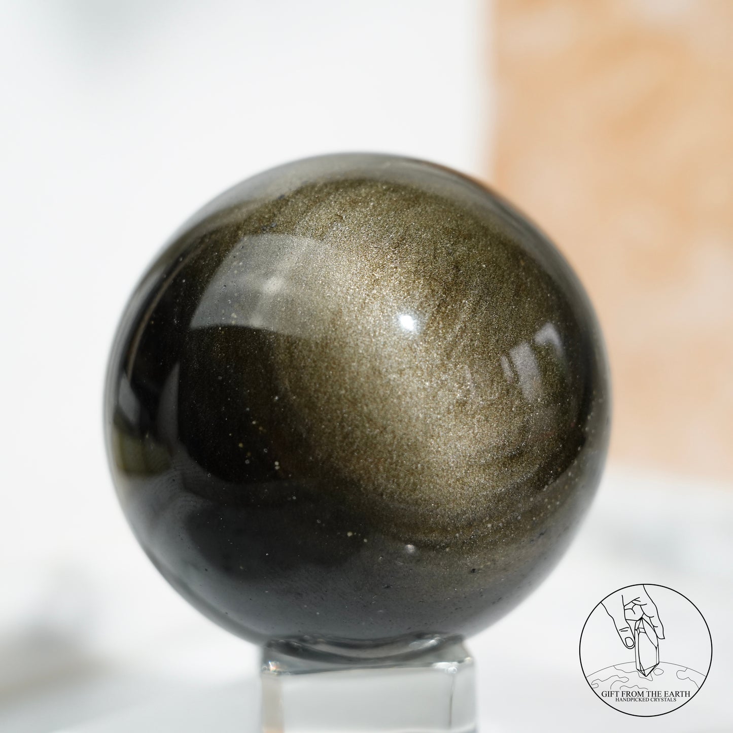 Golden obsidian sphere
