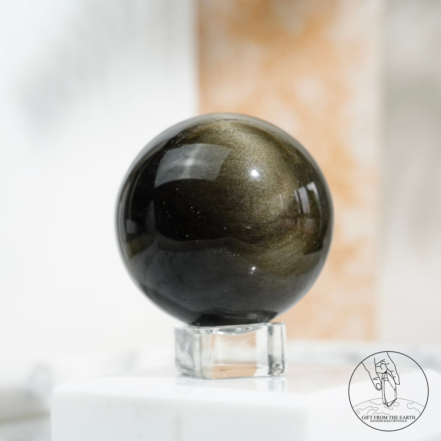 Golden obsidian sphere