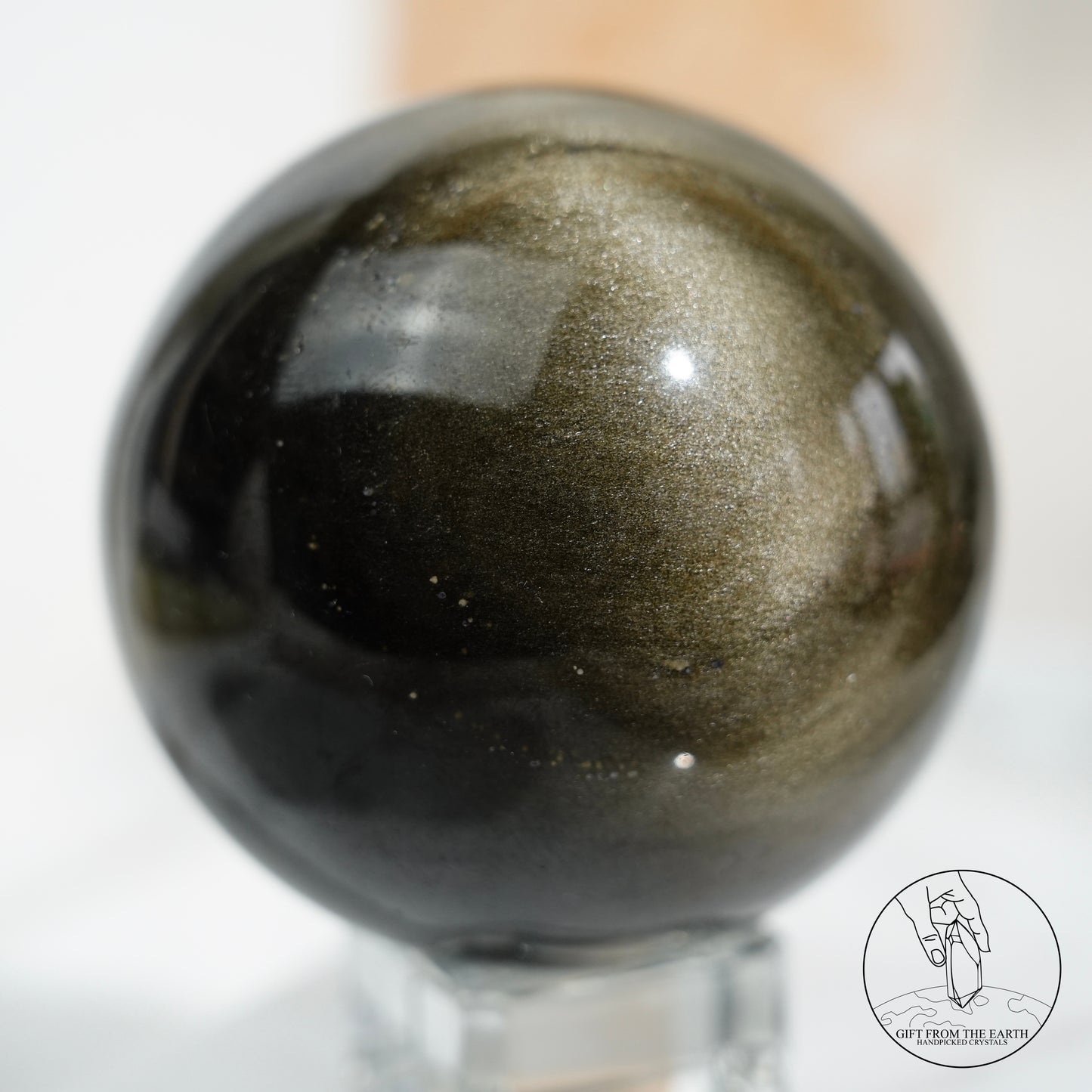 Golden obsidian sphere