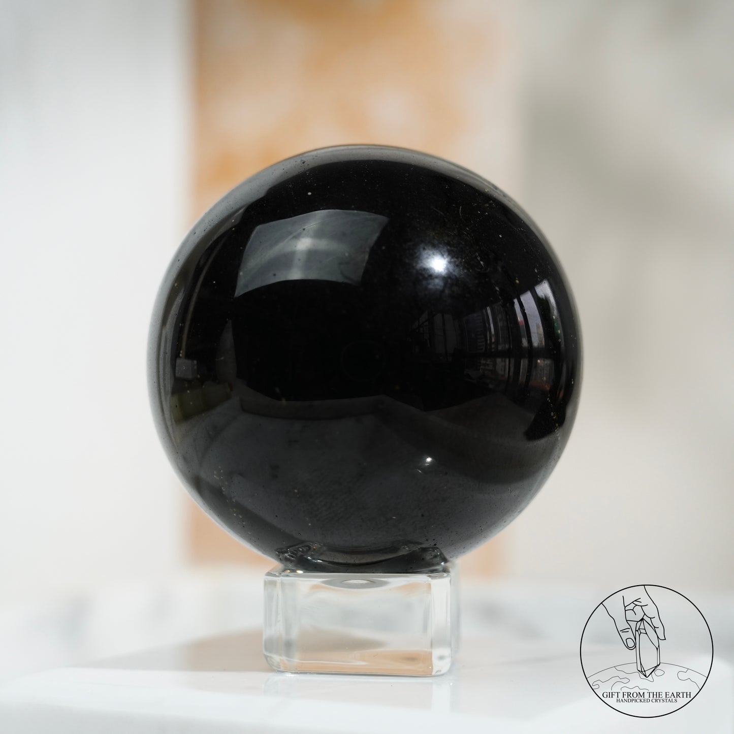 Golden obsidian sphere