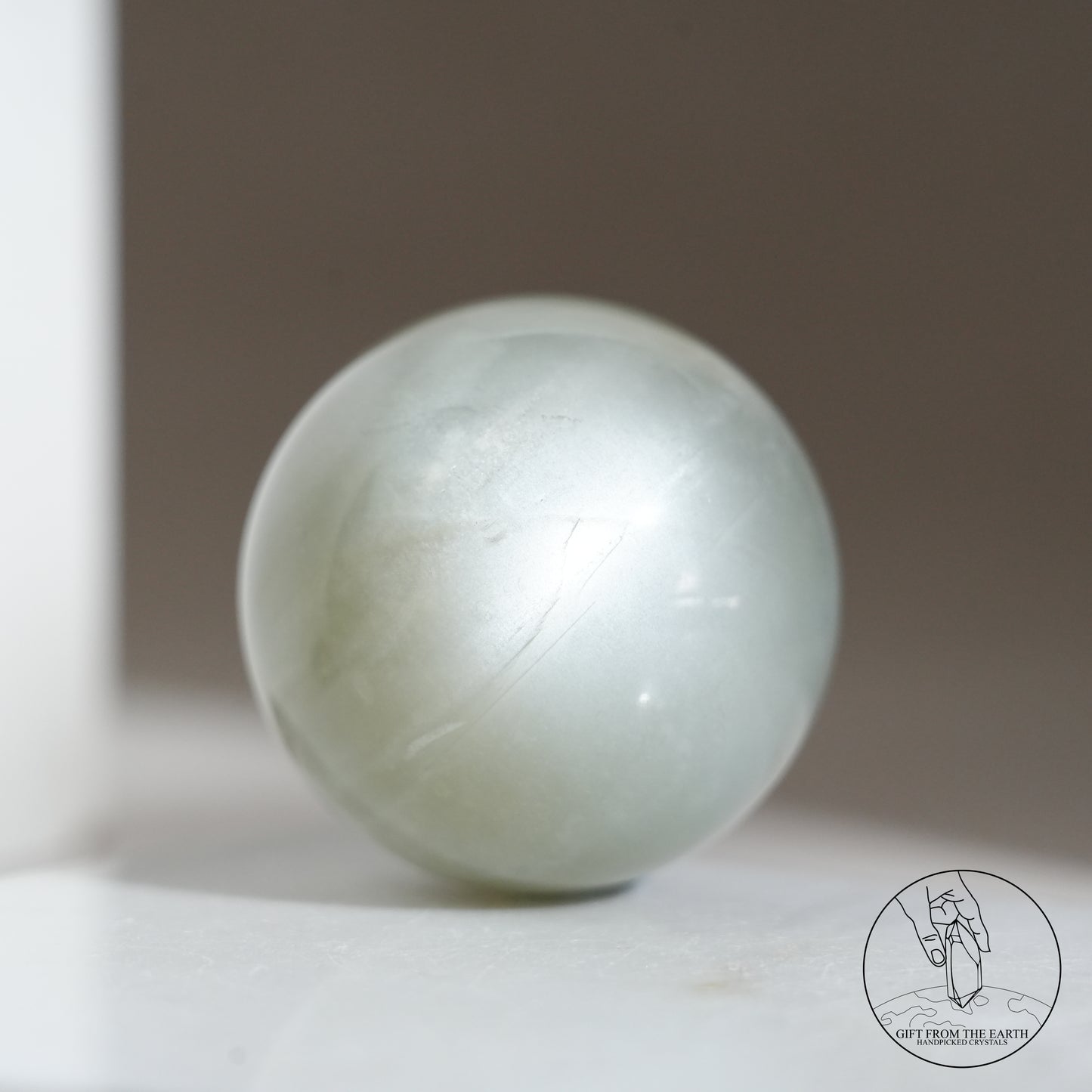 Tanzanian green moonstone sphere