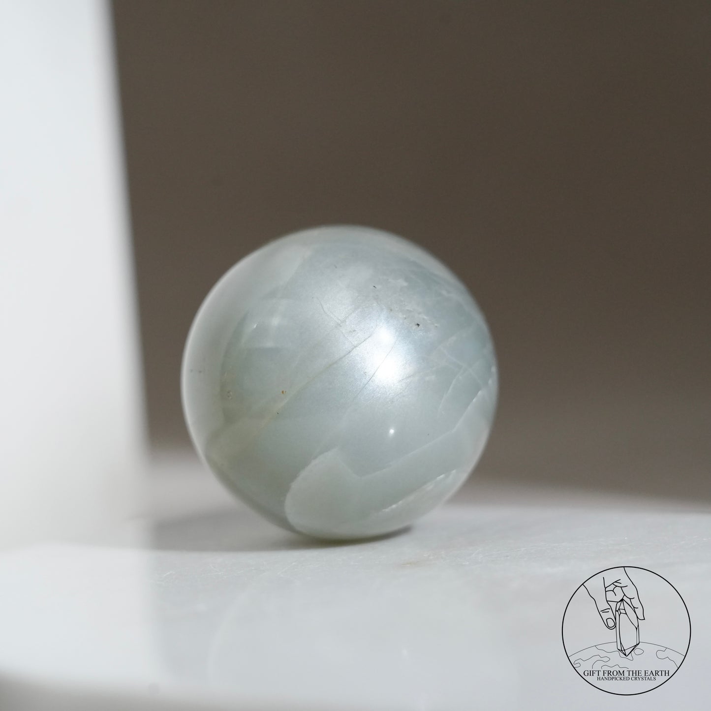Tanzanian green moonstone sphere