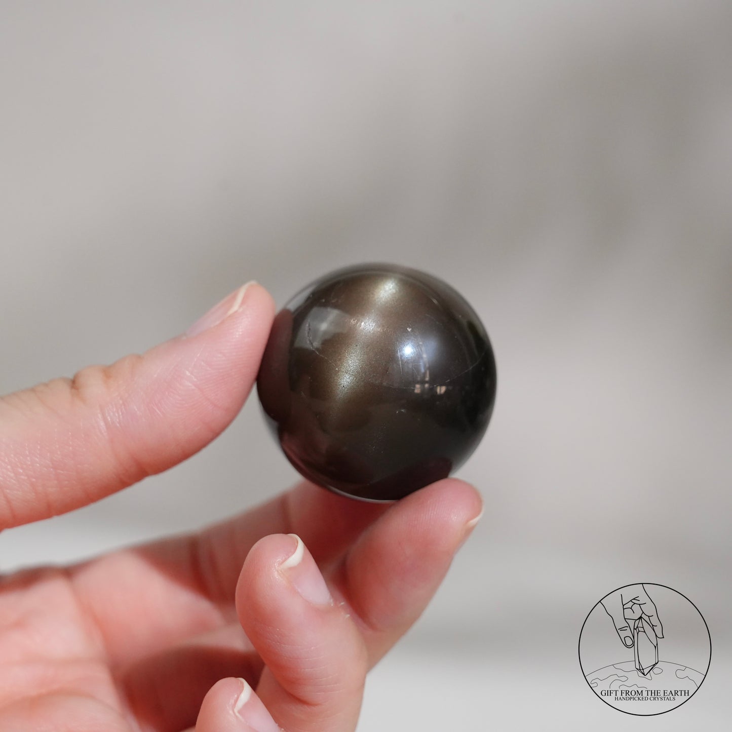 Black sunstone sphere