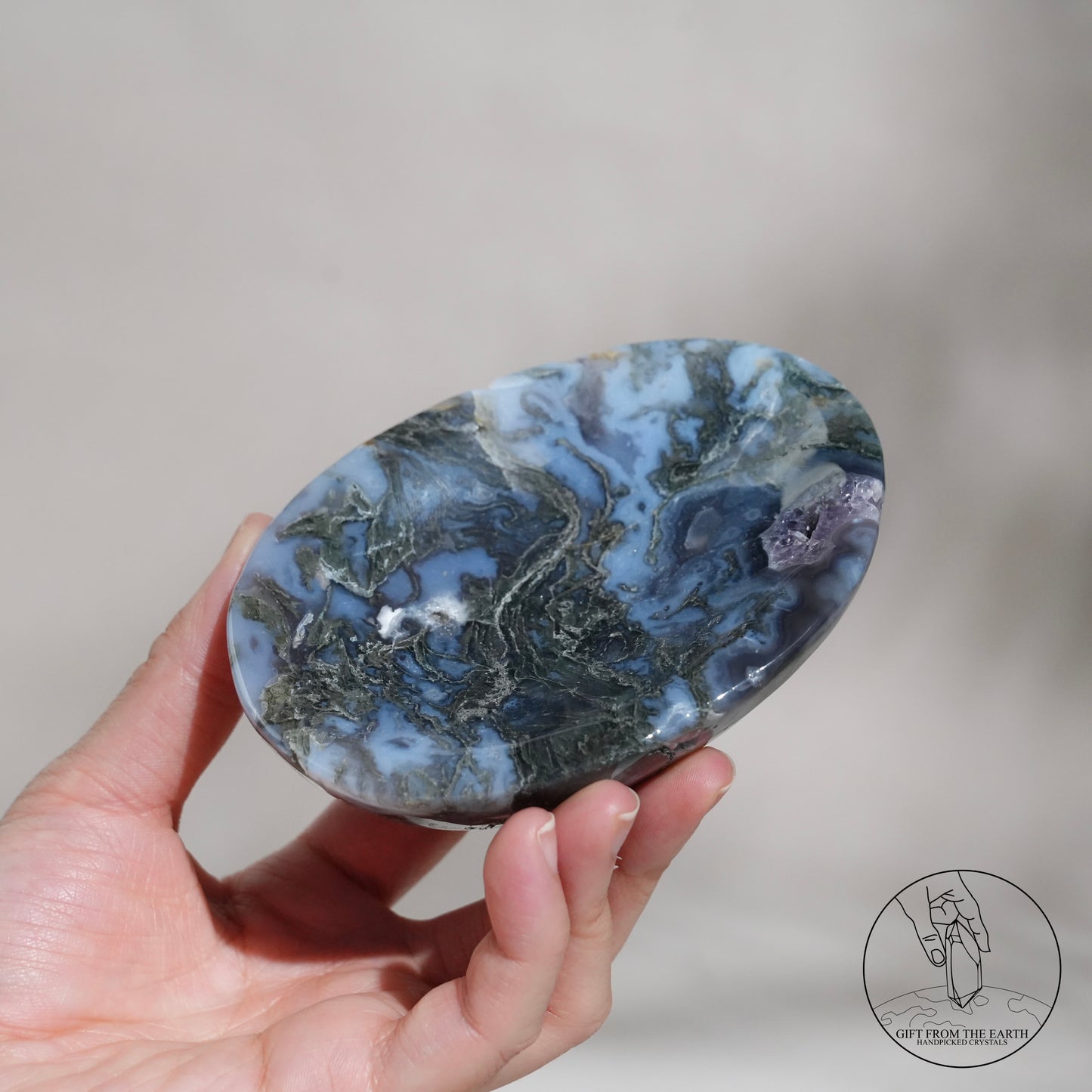 Double-terminated moss agate