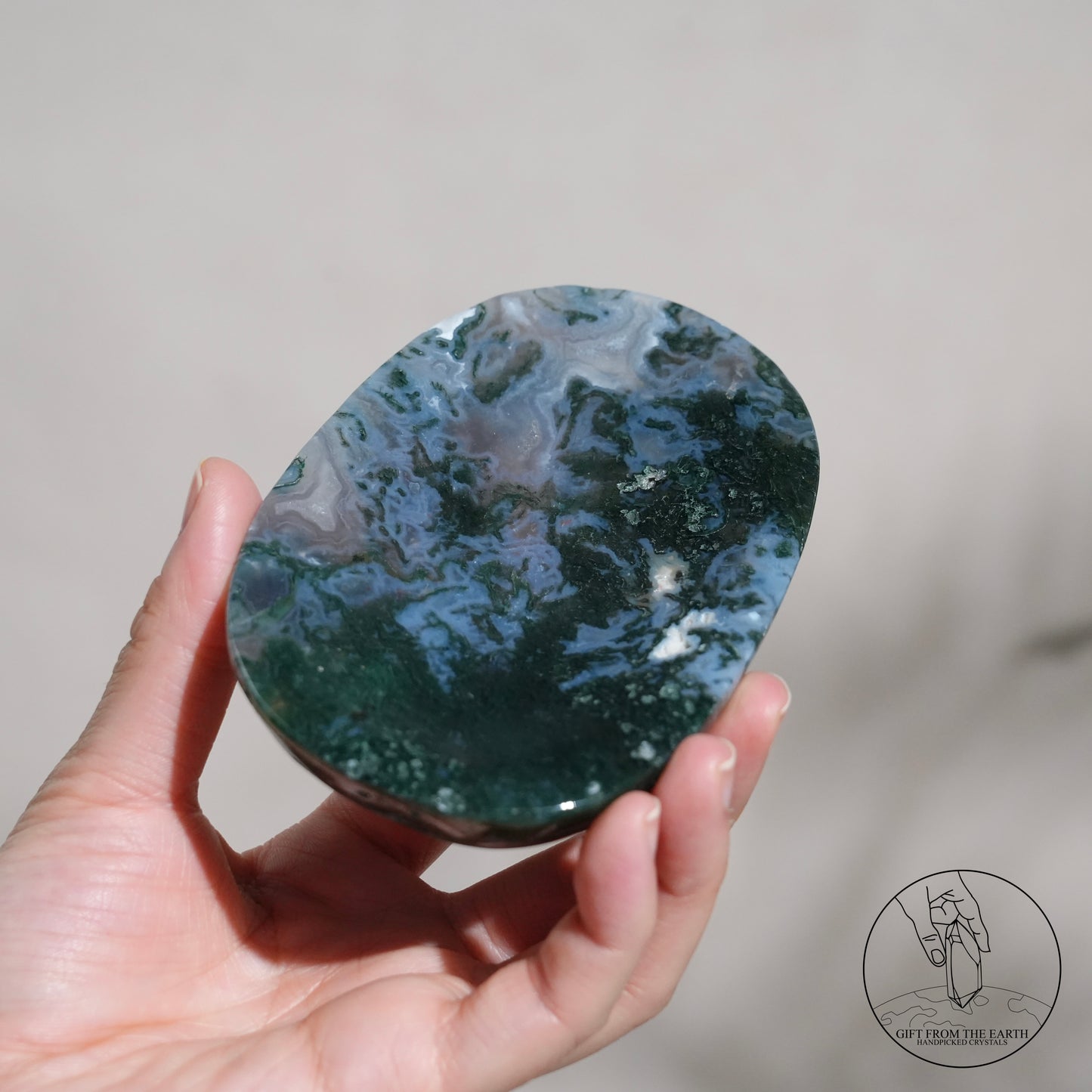 Double-terminated moss agate