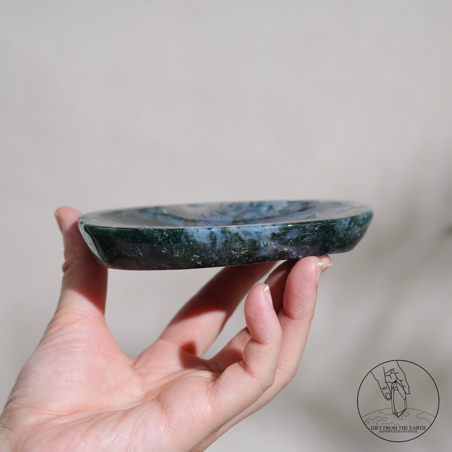 Double-terminated moss agate