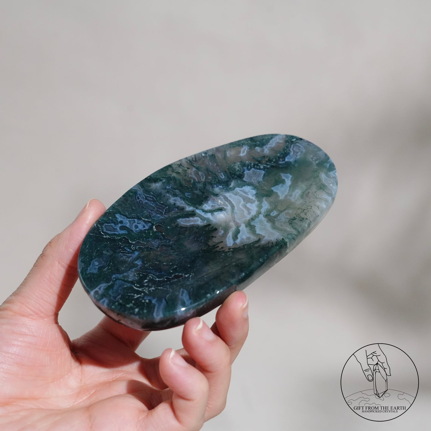 Double-terminated moss agate