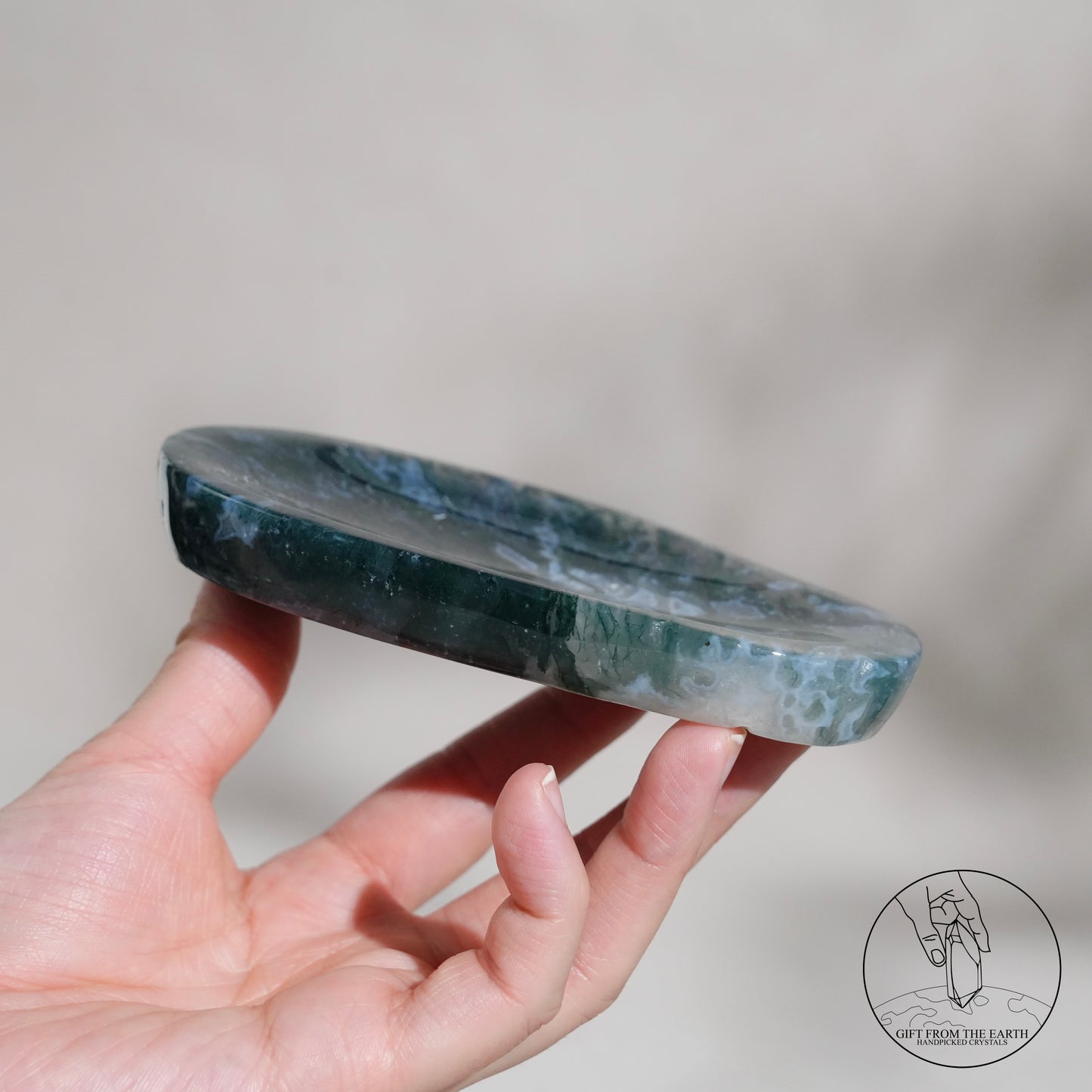 Double-terminated moss agate