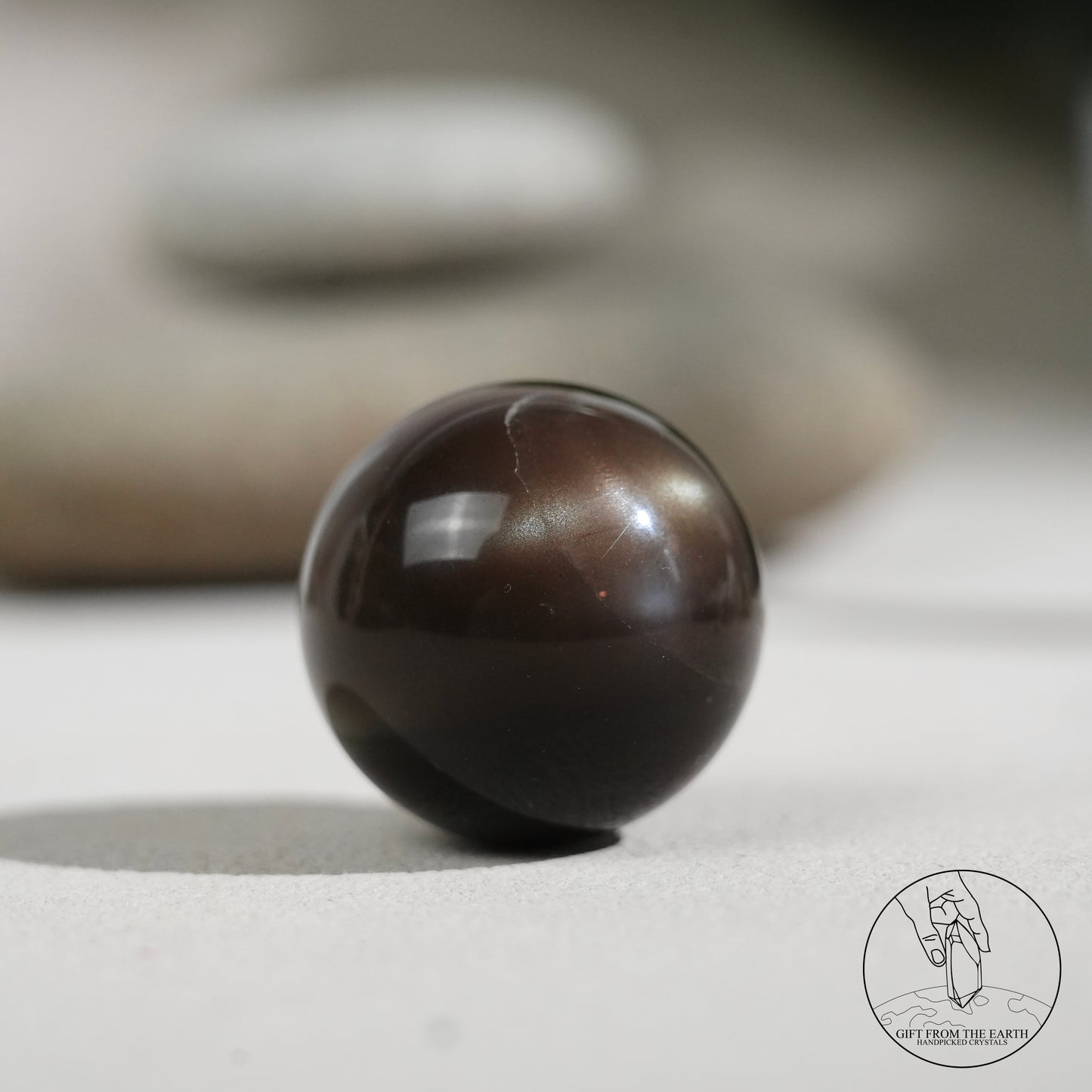 Black sunstone sphere