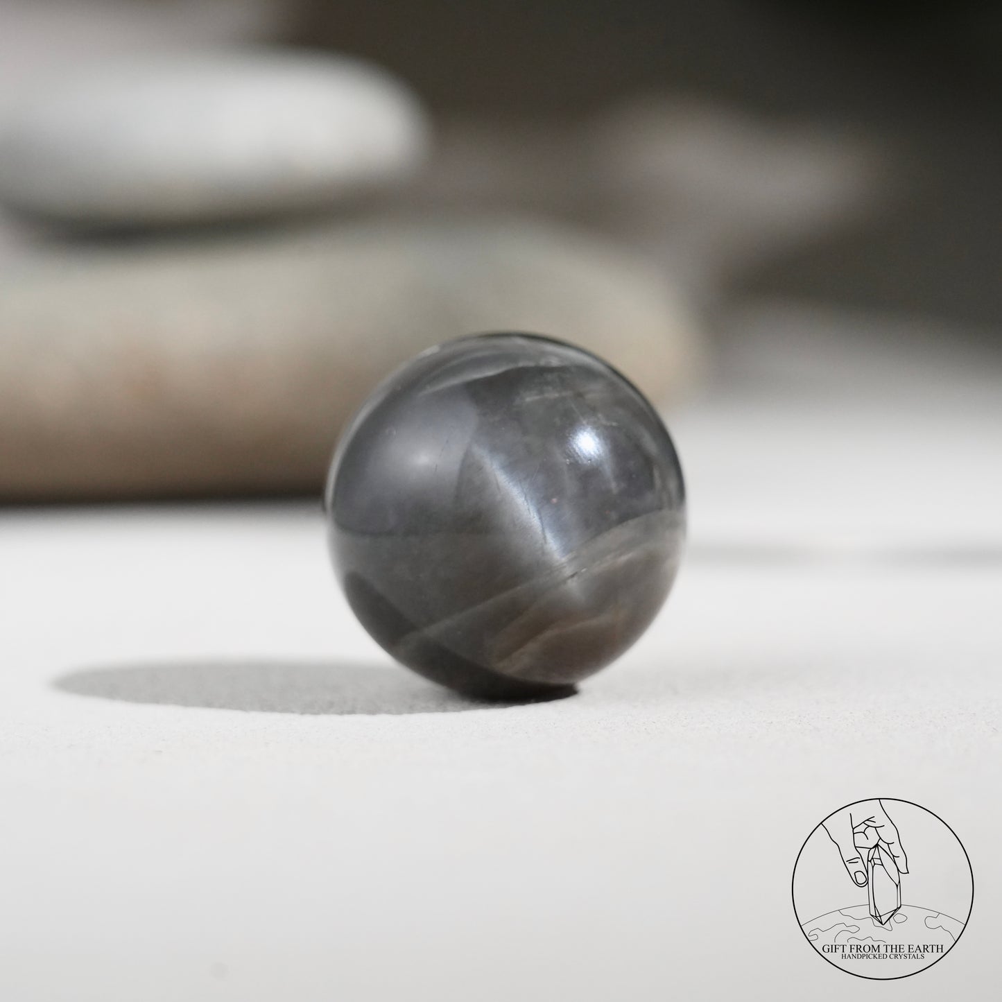 Black sunstone sphere