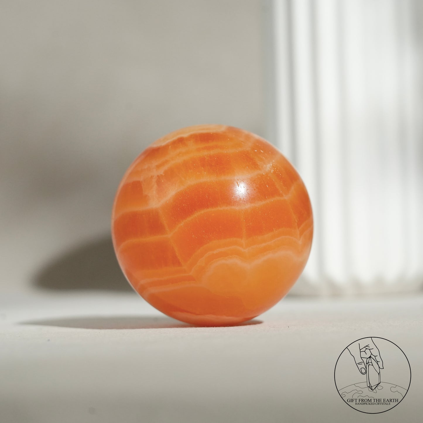 Orange calcite point