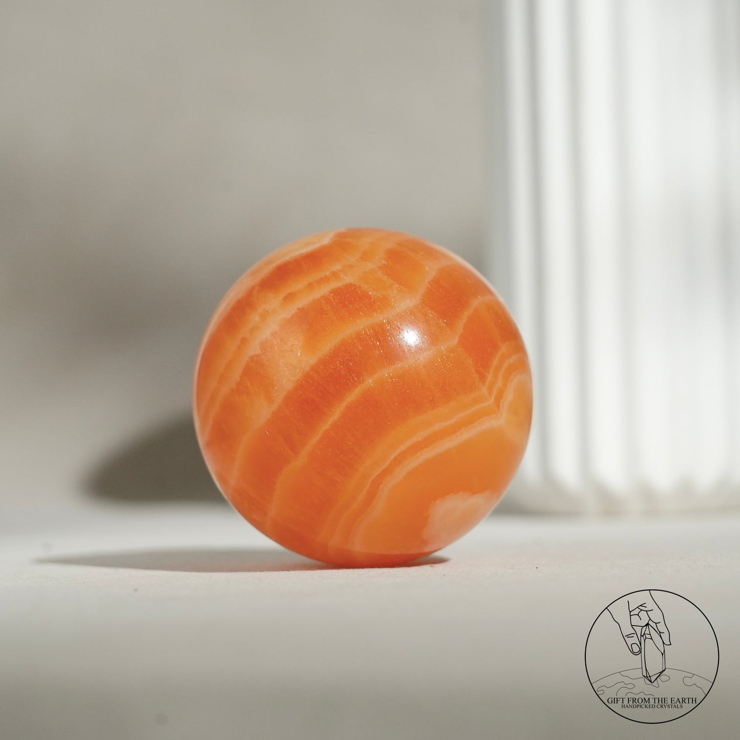 Orange calcite point