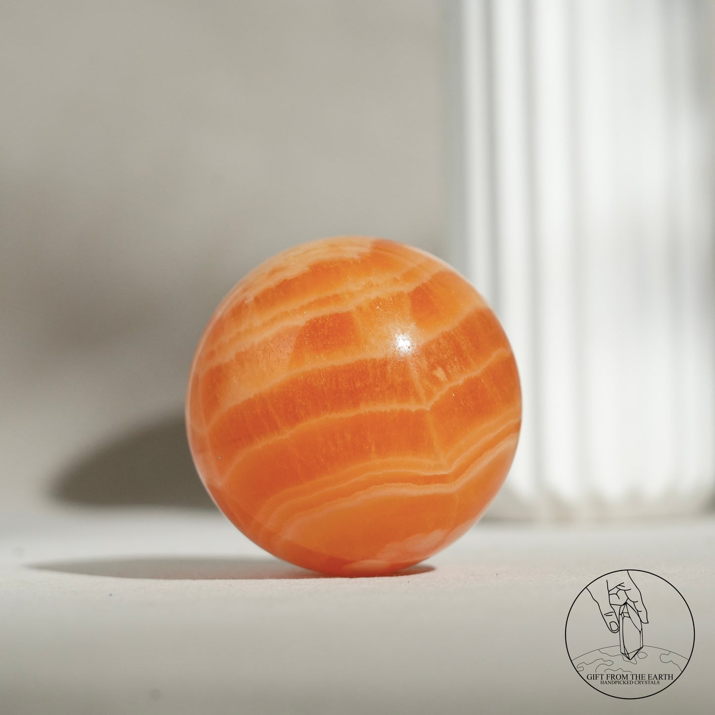 Orange calcite point