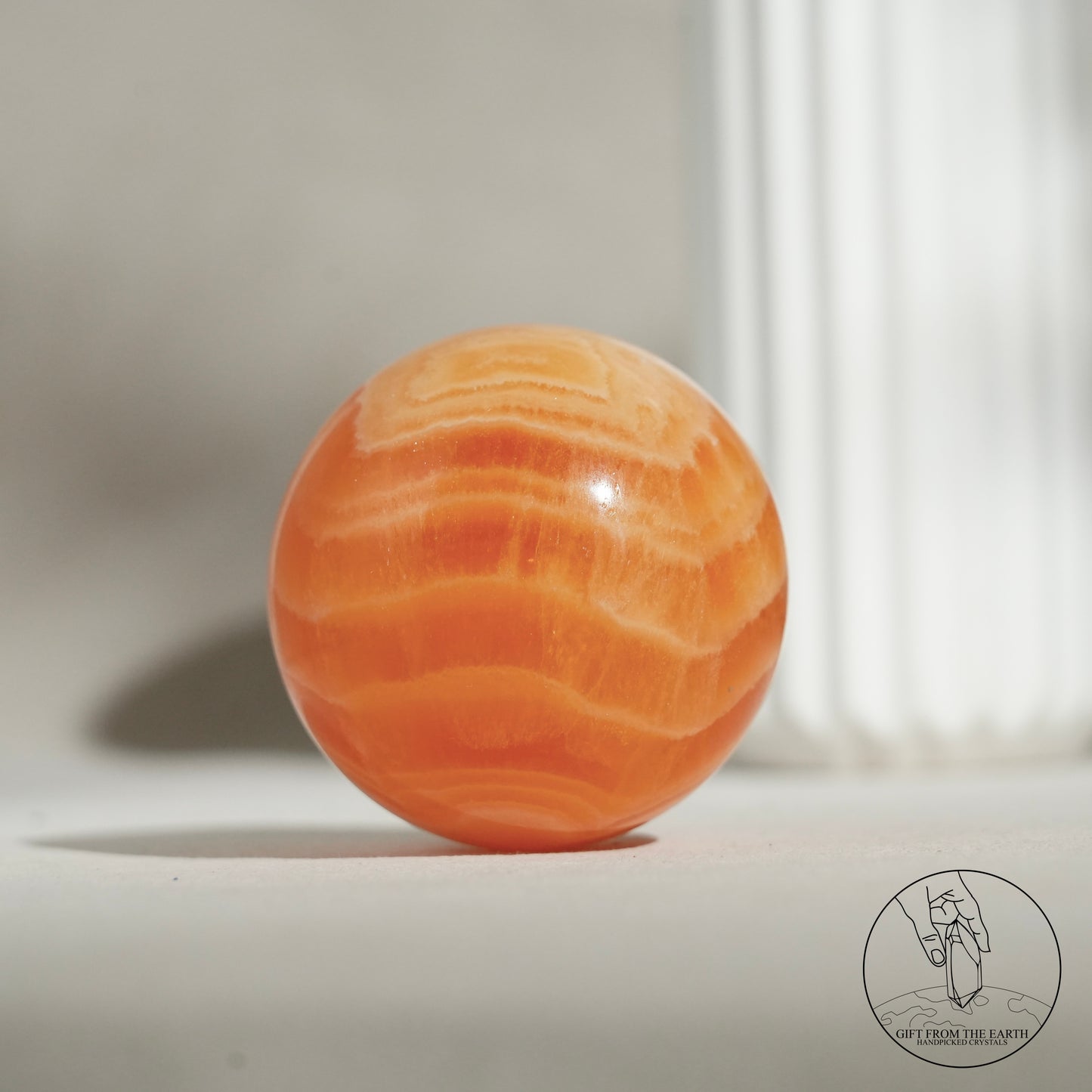 Orange calcite point