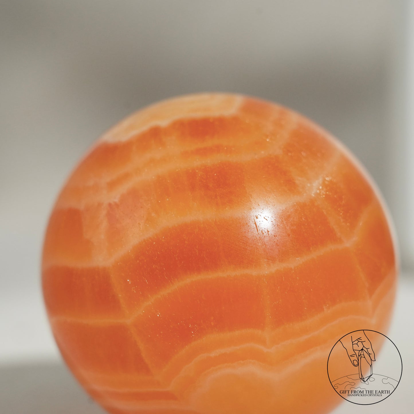 Orange calcite point