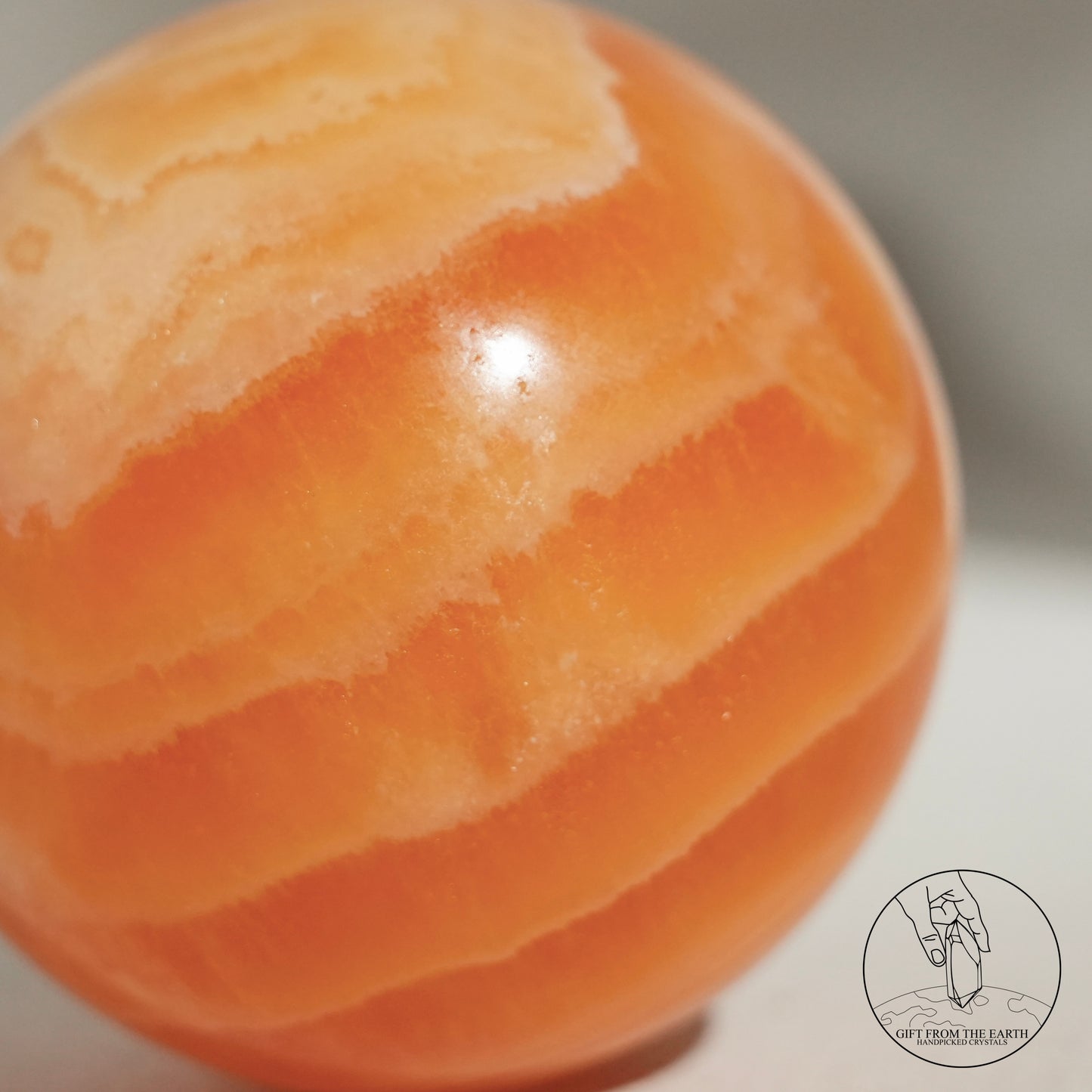 Orange calcite point