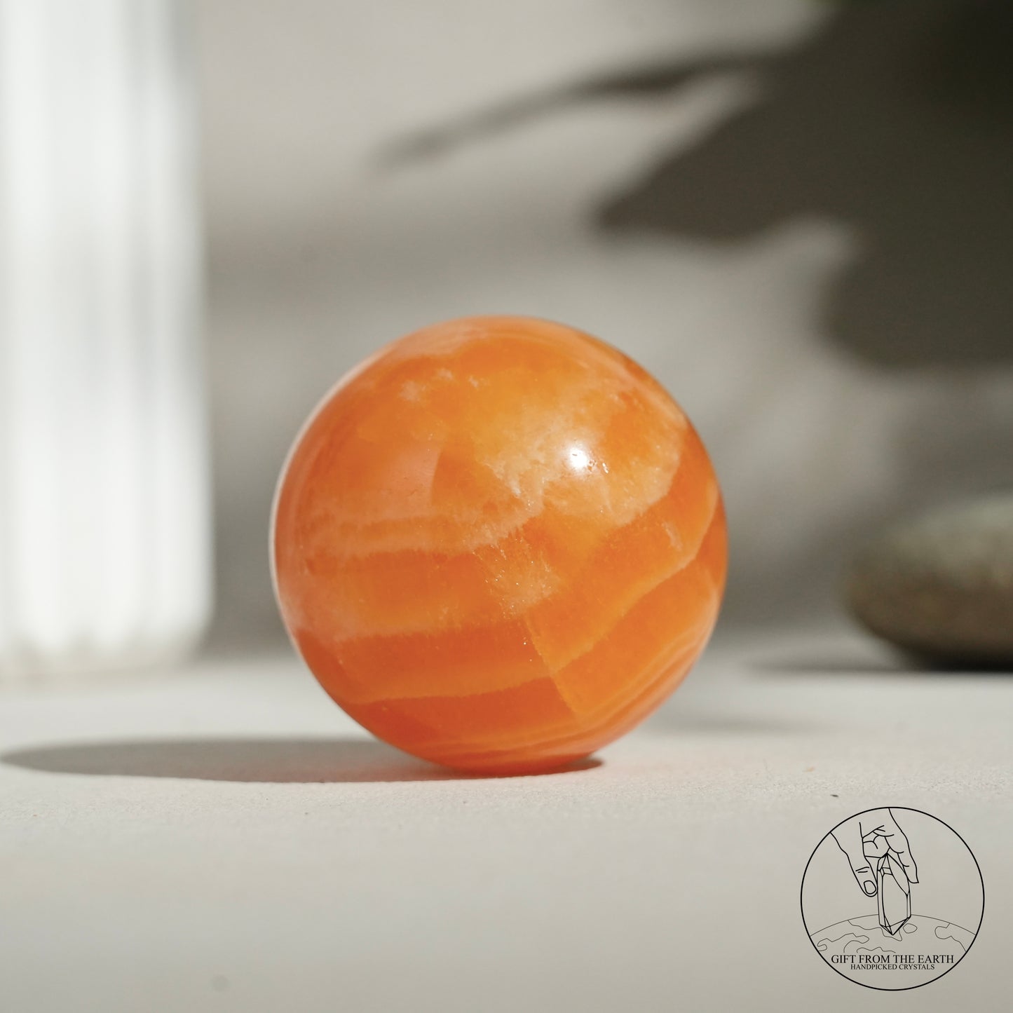 Orange calcite point