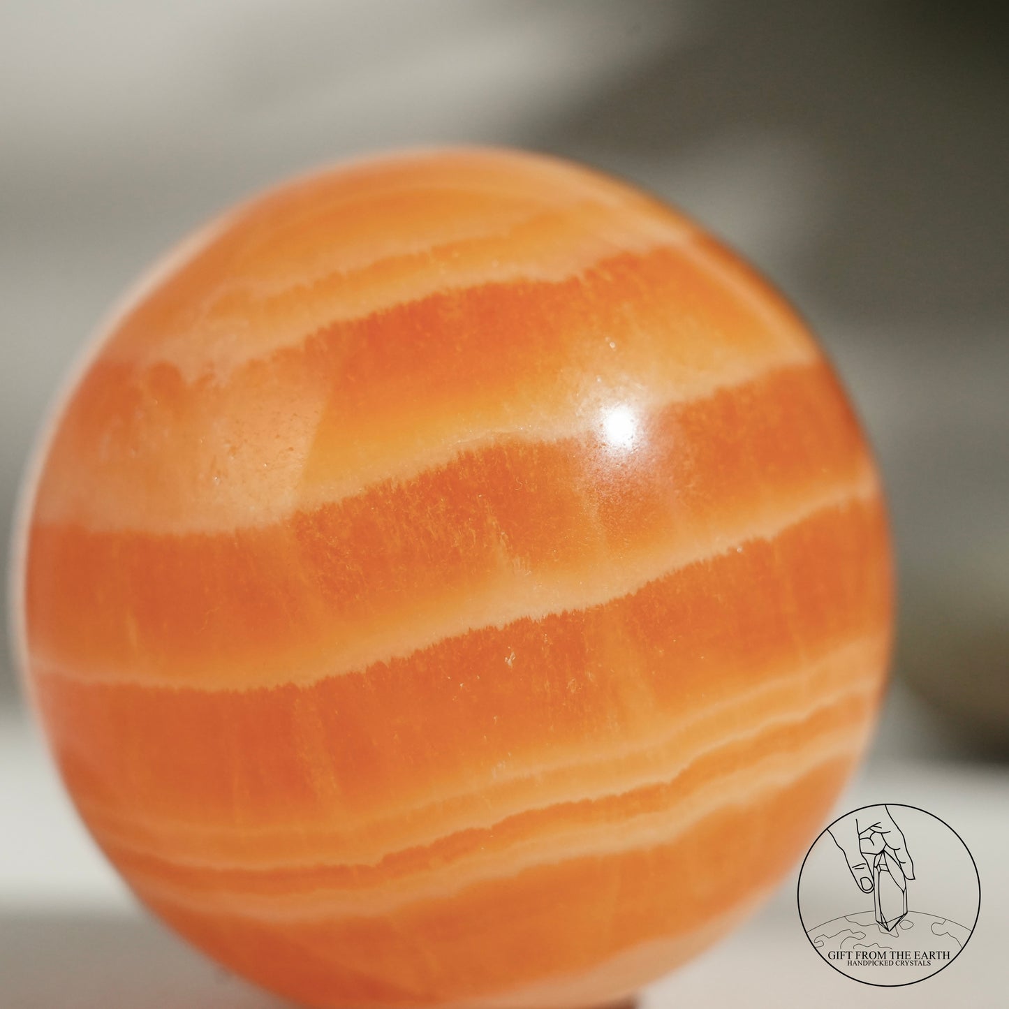 Orange calcite point