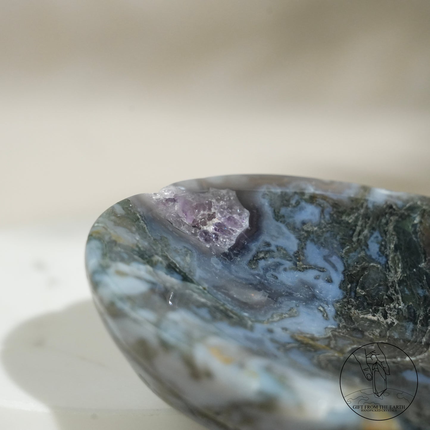 Double-terminated moss agate