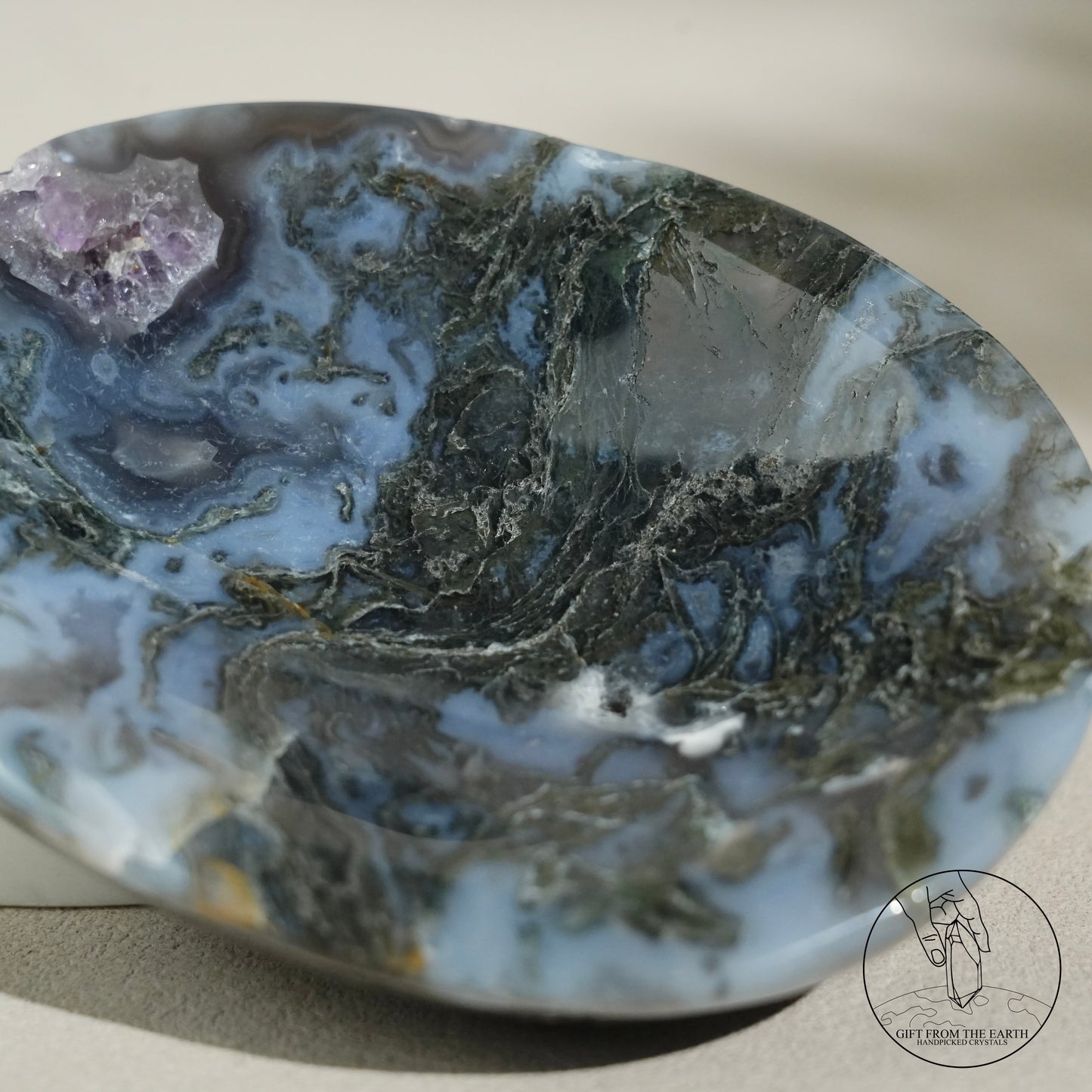 Double-terminated moss agate