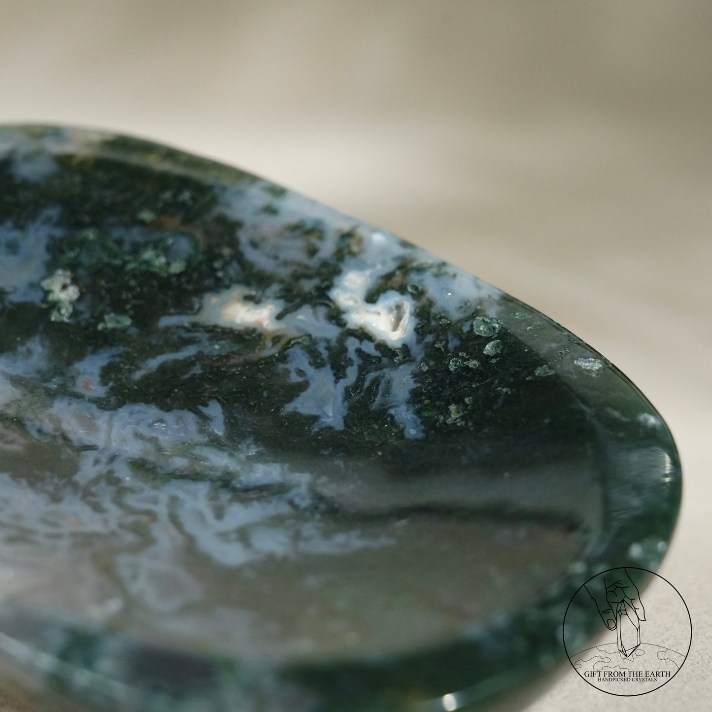 Double-terminated moss agate