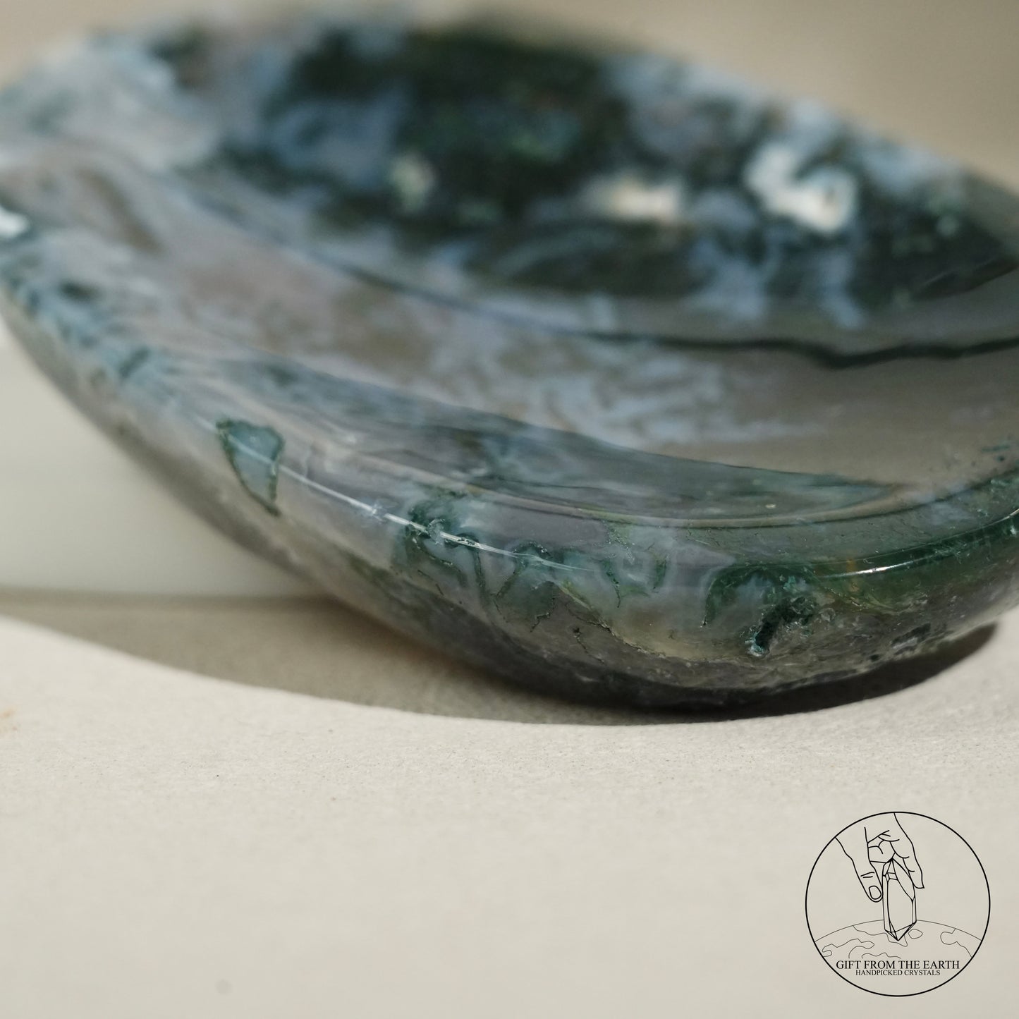 Double-terminated moss agate