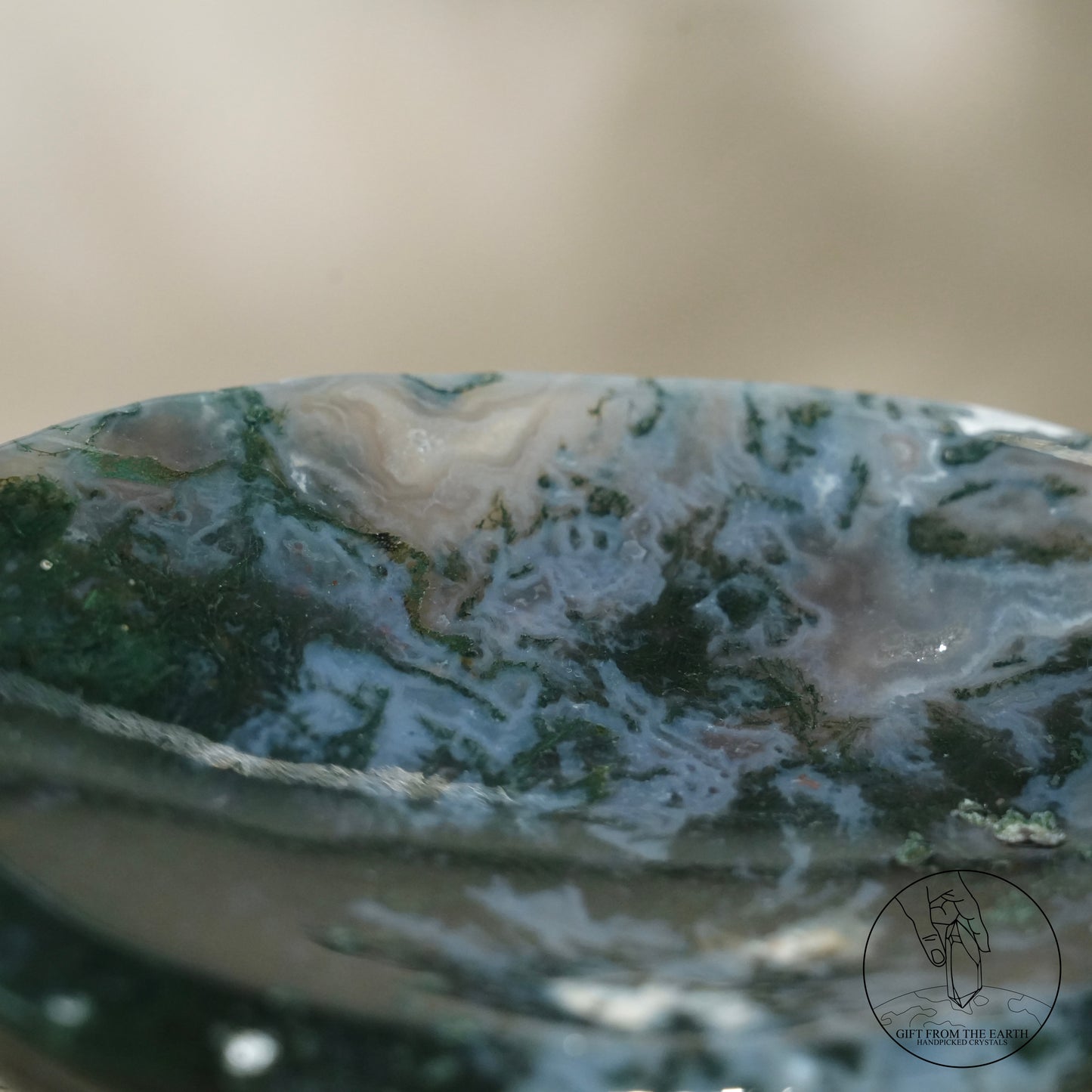 Double-terminated moss agate