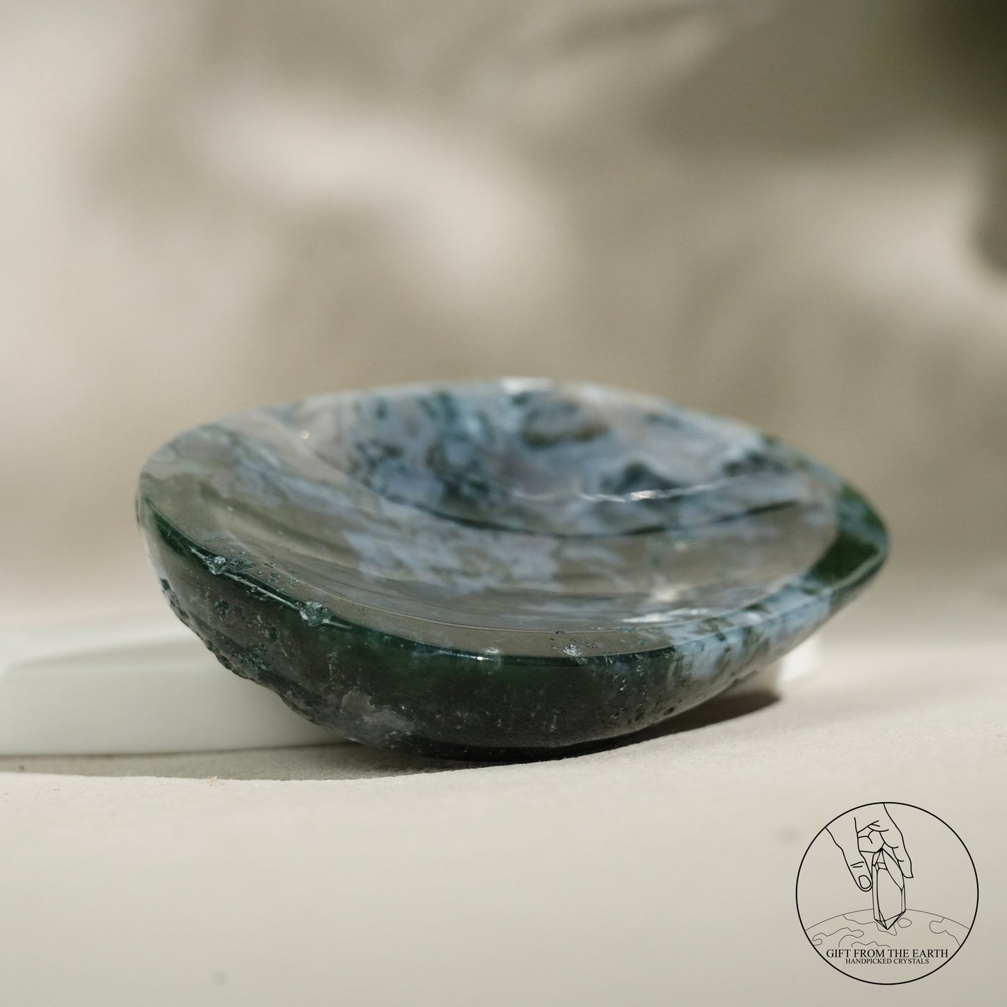 Double-terminated moss agate
