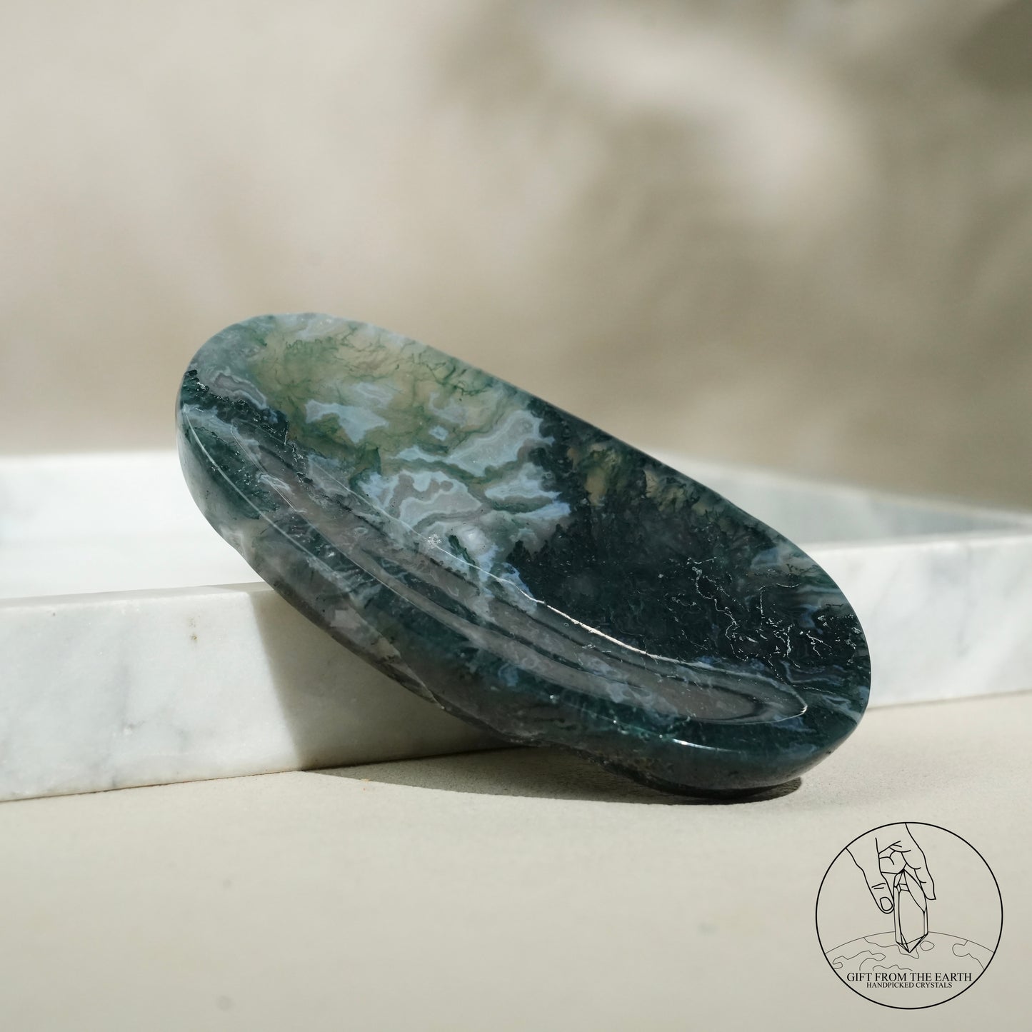 Double-terminated moss agate