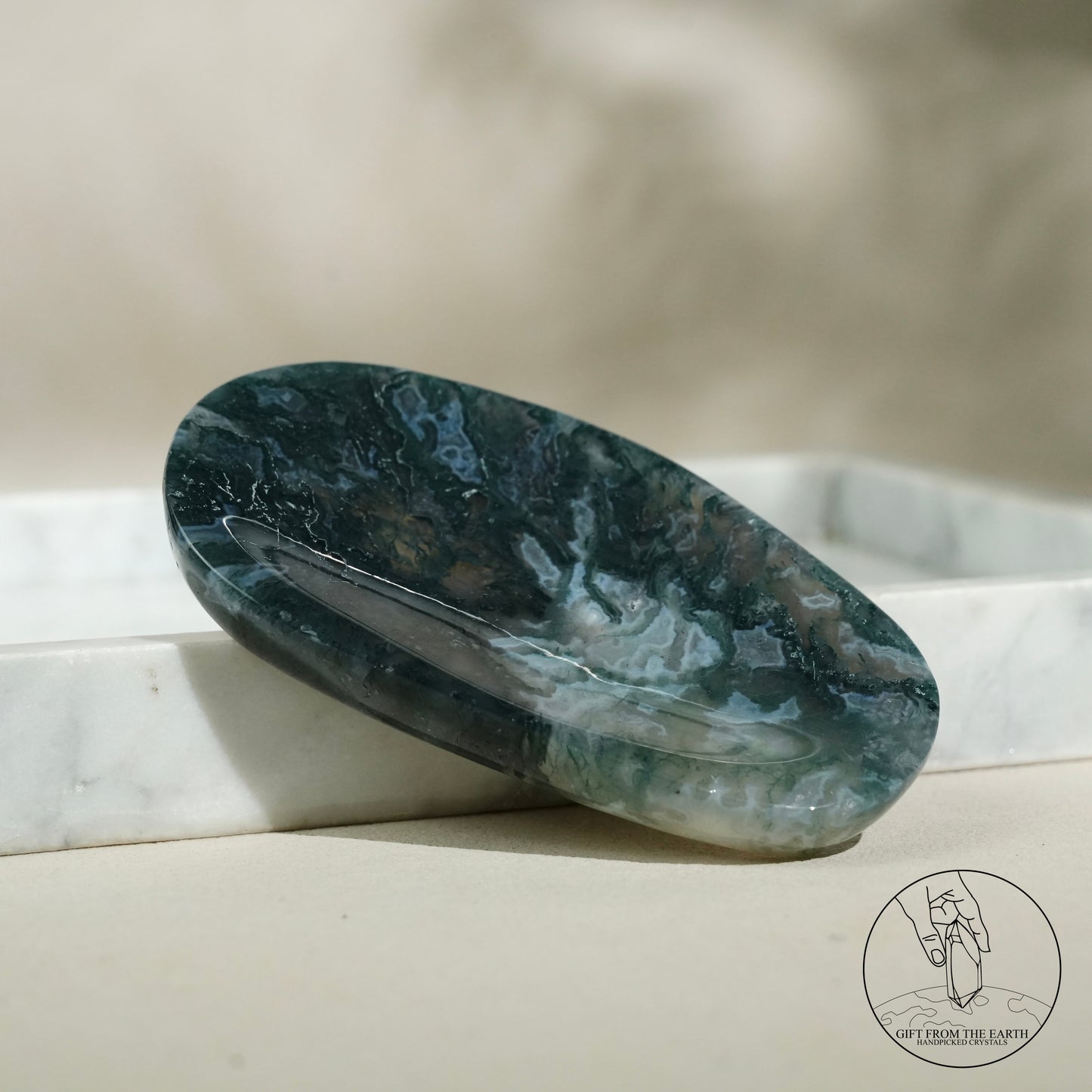 Double-terminated moss agate