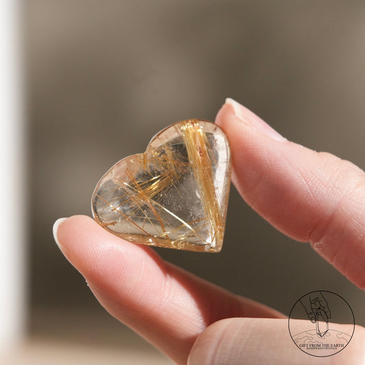 Silver rutilated quartz point