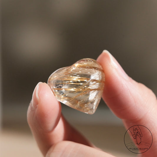 Silver rutilated quartz point