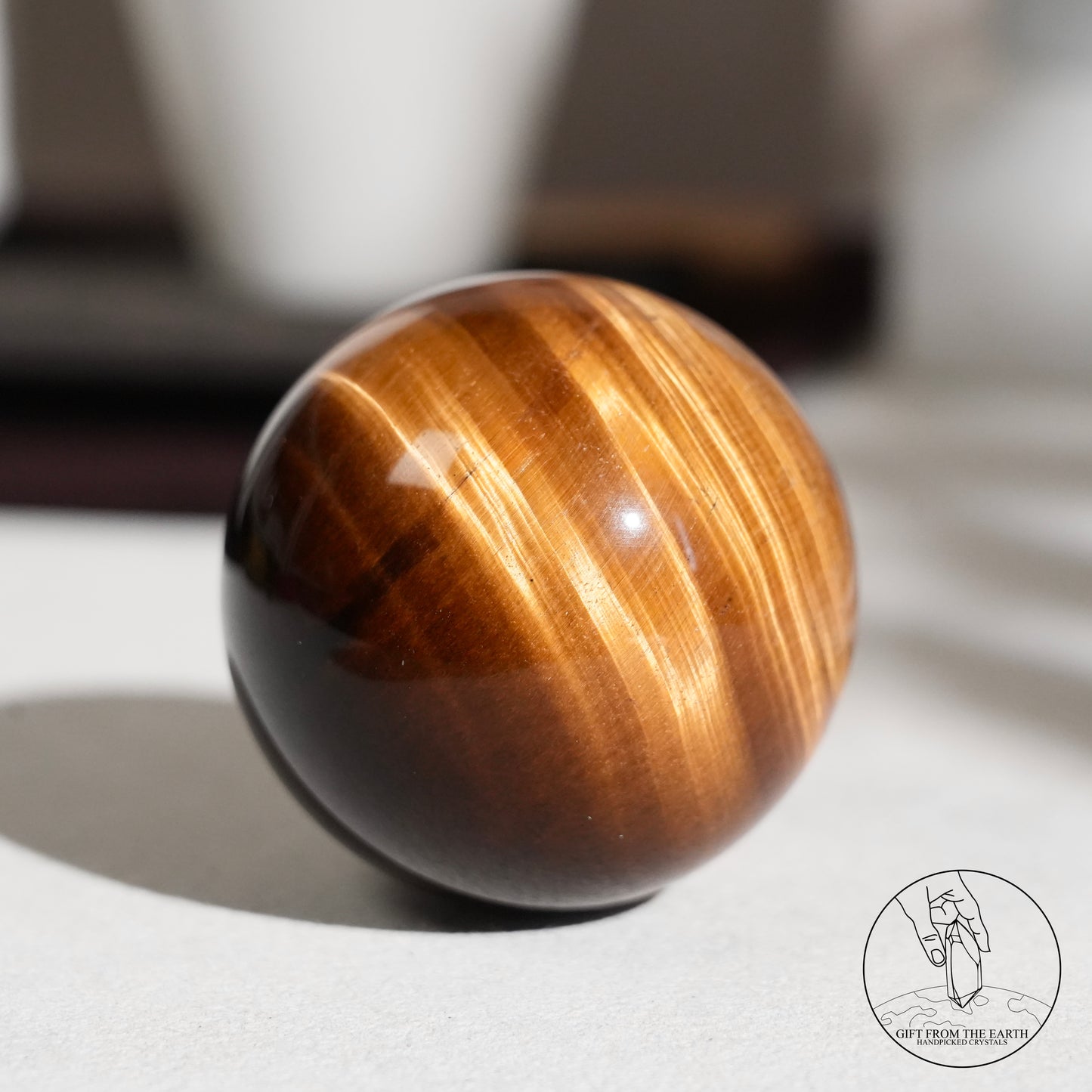 Yellow tiger's eye sphere