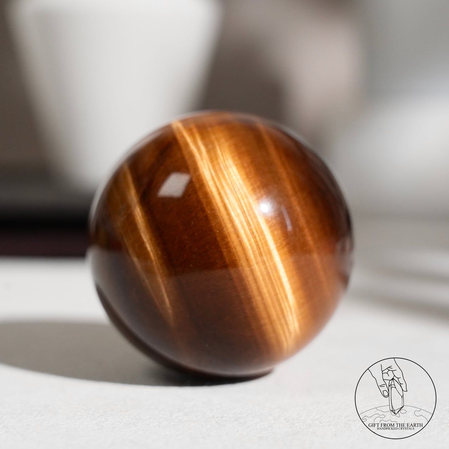 Yellow tiger's eye sphere